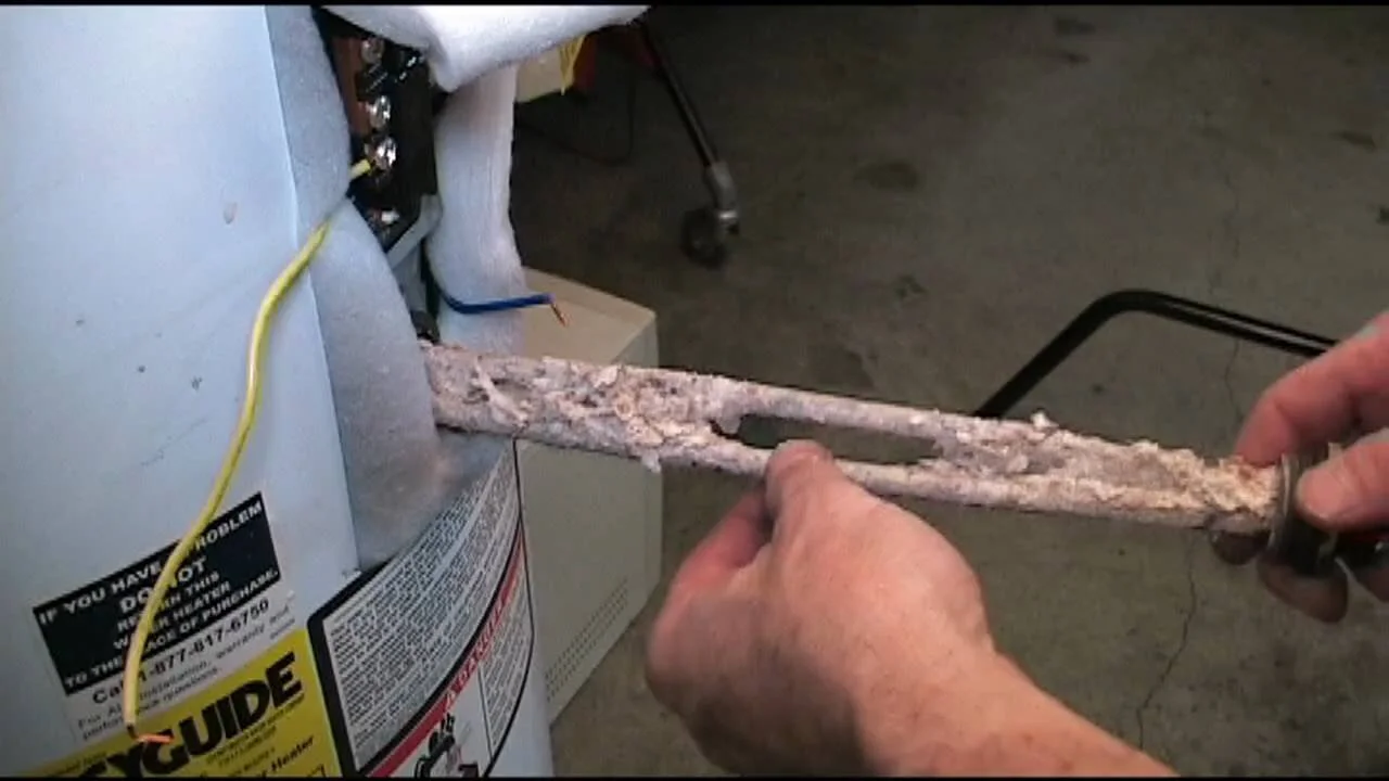   A scaled electrical element from a tank hot water heater  