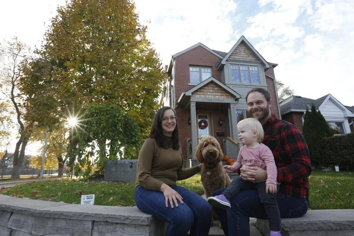 Picture of BVM Contracting Clients Posing For Toronto Star Article about their East York Home Addition