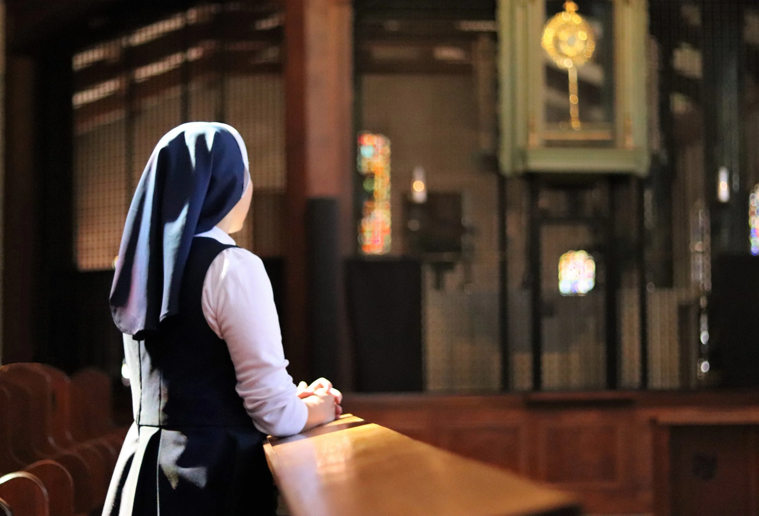 Postulant in choir.jpg