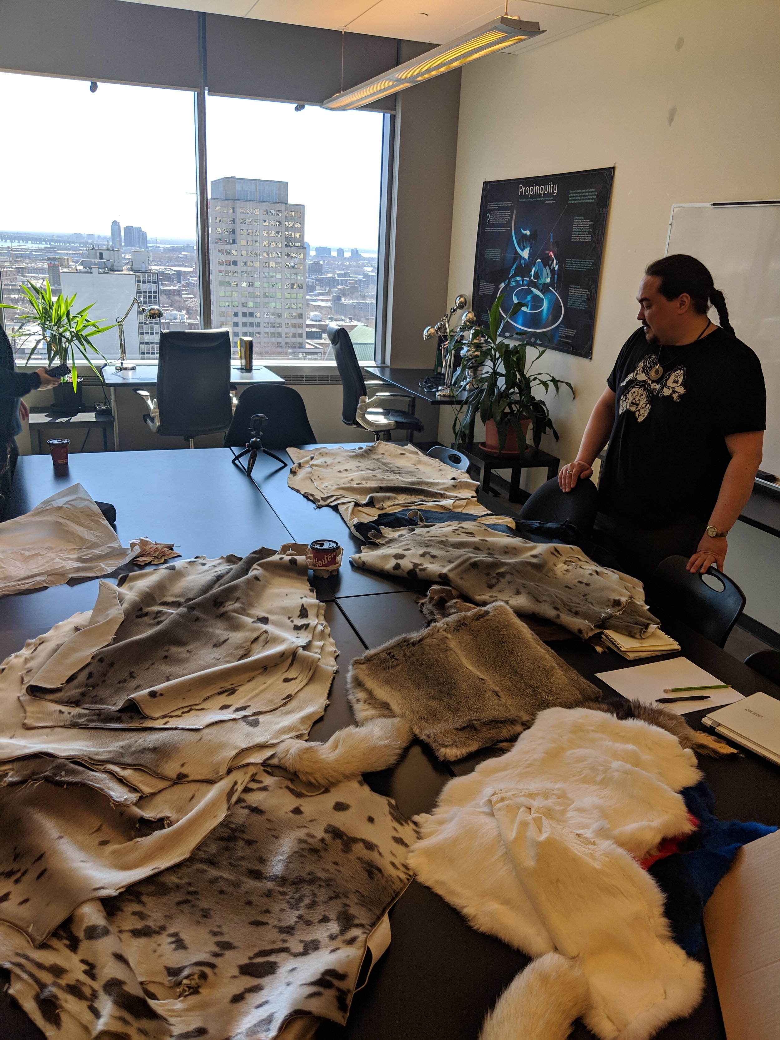  Jesse with materials for  Seal Skin Spacesuit  (2019). Photo by Amanda Shore. 