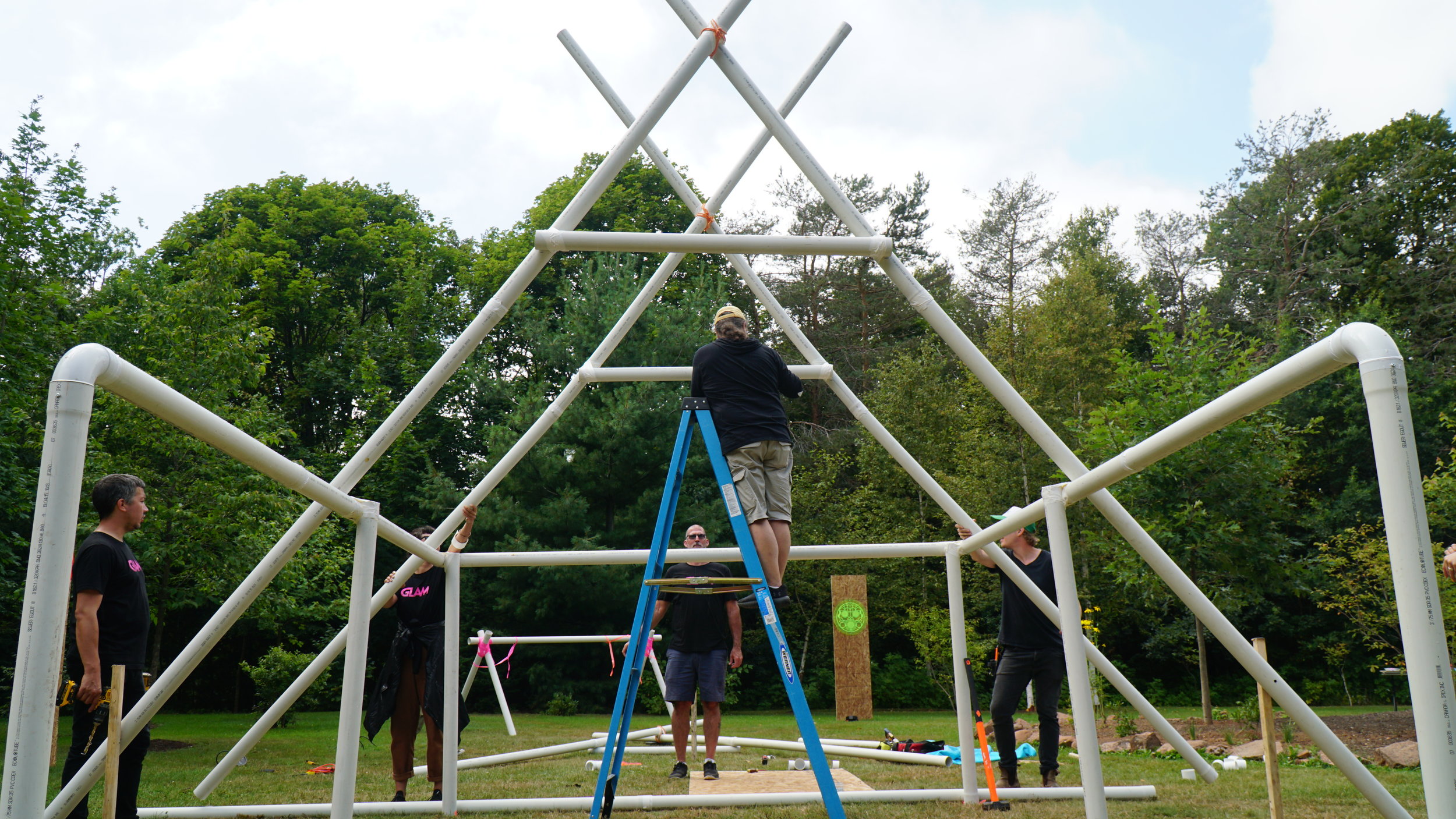  Tent structure mid-installation for  Memory Keepers II  at Art in the Open, Charlottetown, PEI. August 2019. Photo by Amanda Shore. 