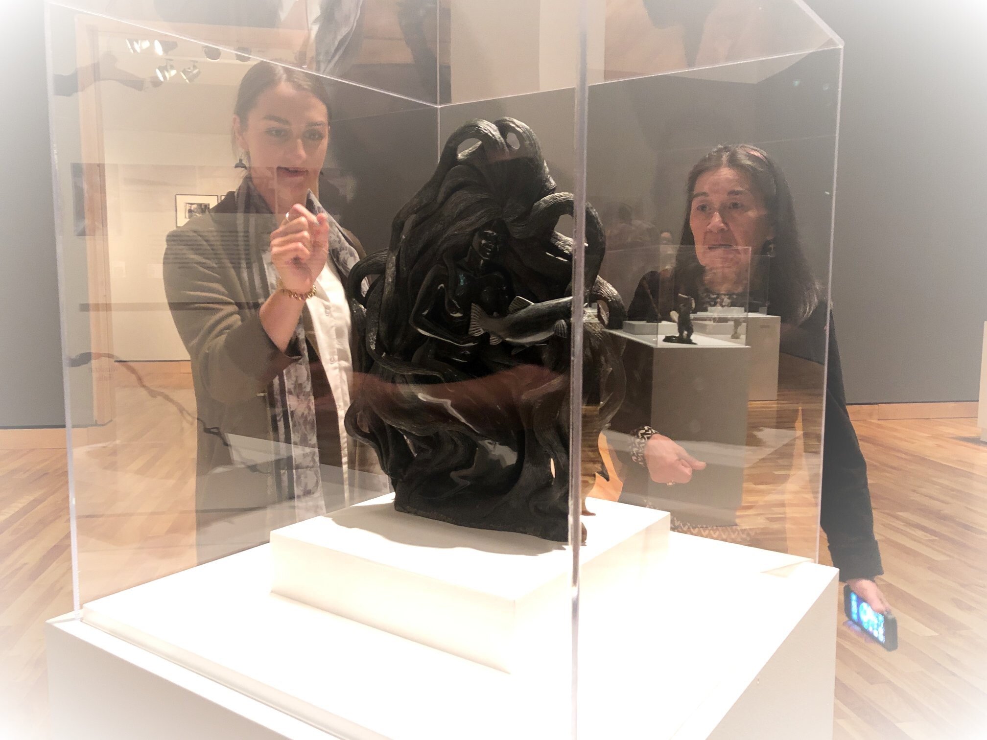  Jessica and a visitor at  Saunituinnaulungitotluni | Beyond Bone , The Rooms, St. John’s, NL, May 2019. Photo courtesy of Jessica Winters. 