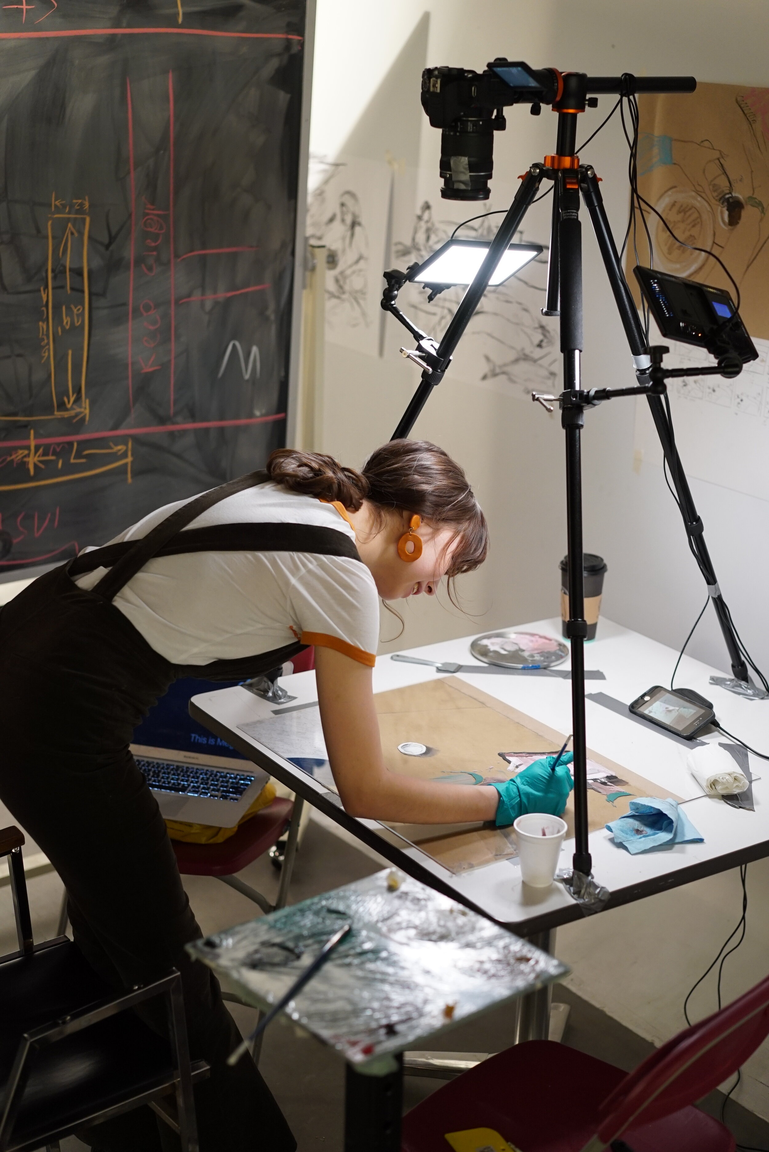  Megan working on  Large Feast on a Bed of Cardboard (Maktaaq)  (2019) for  Memory Keepers I , Concordia University, Montreal QC, March 2019. Photo by Amanda Shore. 