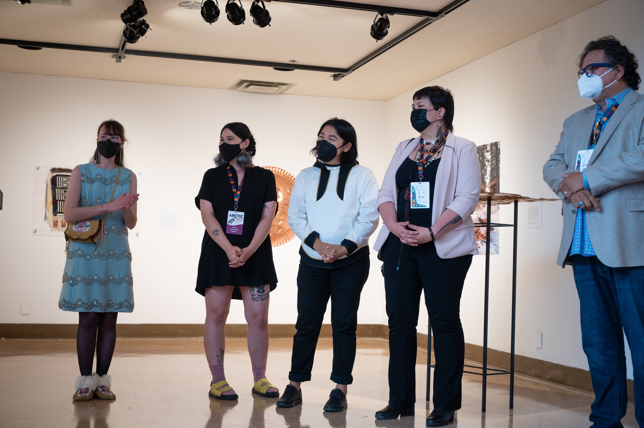   TETHER  co-curators Teresa Vander Meer-Chassé, Leanne Inuarak-Dall, Darcie “Ouiyaghasiak” Bernhardt, and Heather Von Steinhagen, at the opening reception during the Artcitc Arts Summit, Yukon Arts Centre, Whitehorse, YK, July 2022. Photo by Mike Th