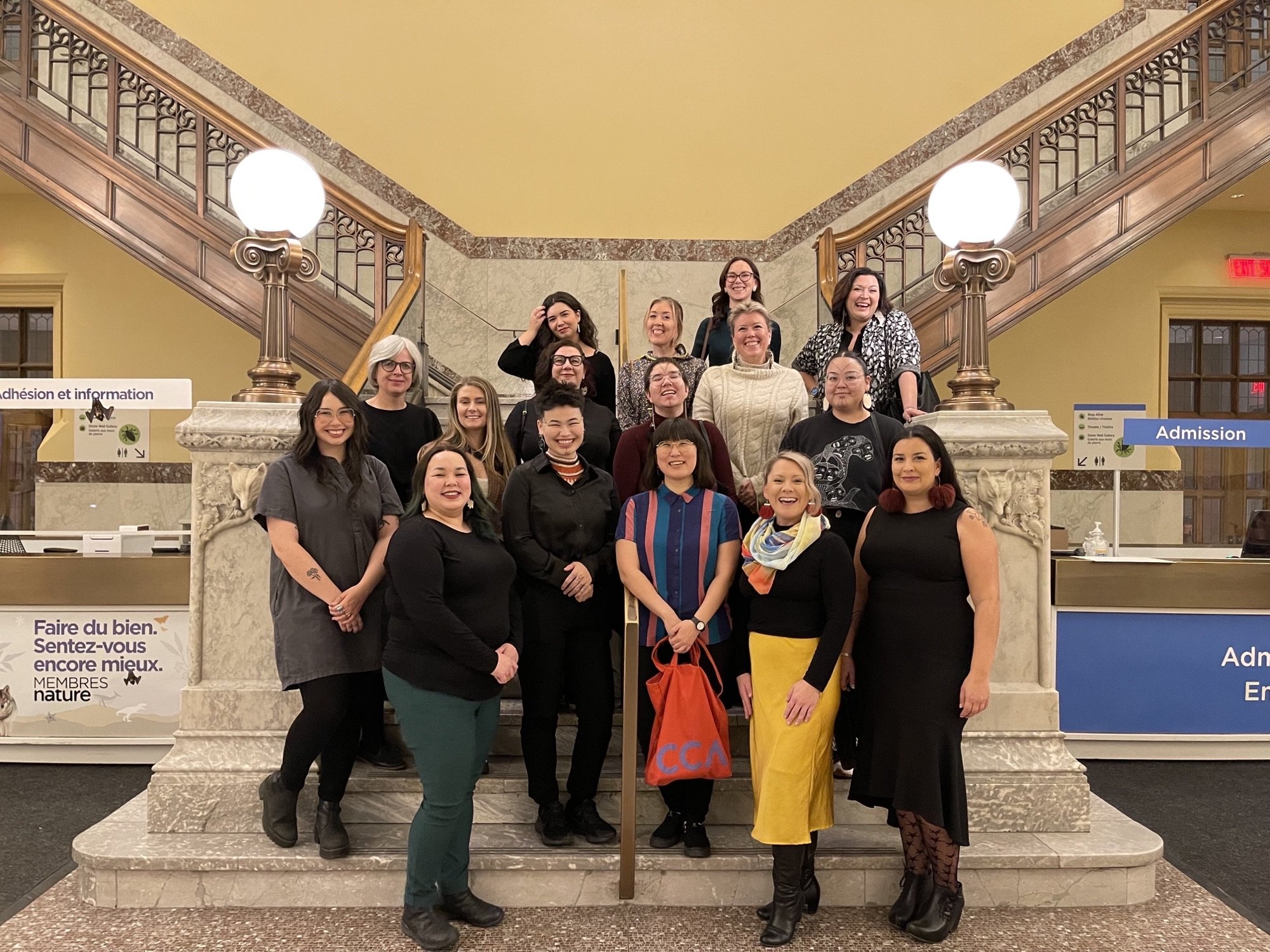  Participants and faculty of the Inuit Futures Curatorial Institute at the Canadian Museum of Nature for the exhibition,  ᓄᓇᕗᑦ, ᑕᑯᒥᓇᕐᑐᓕᐊᕗᑦ / Our Land, Our Art , November 2022, Canadian Museum of Nature, Ottawa, ON. Photo: Danielle Miles. 