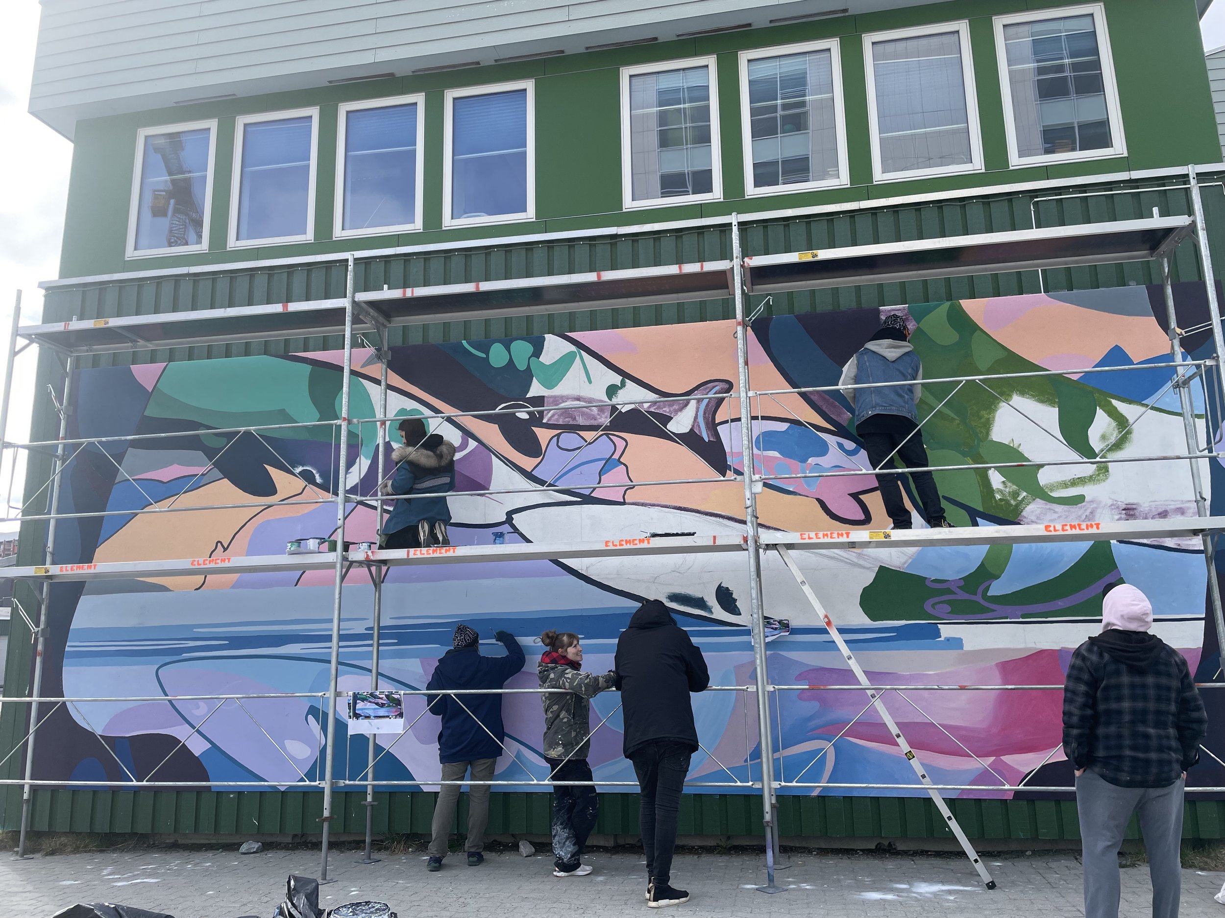  Mural at the Nunatta Atuagaateqarfia for the Nuuk Nordic Festival. Nuuk, Greenland. May 2023. Photograph by Bronson Jacque. 