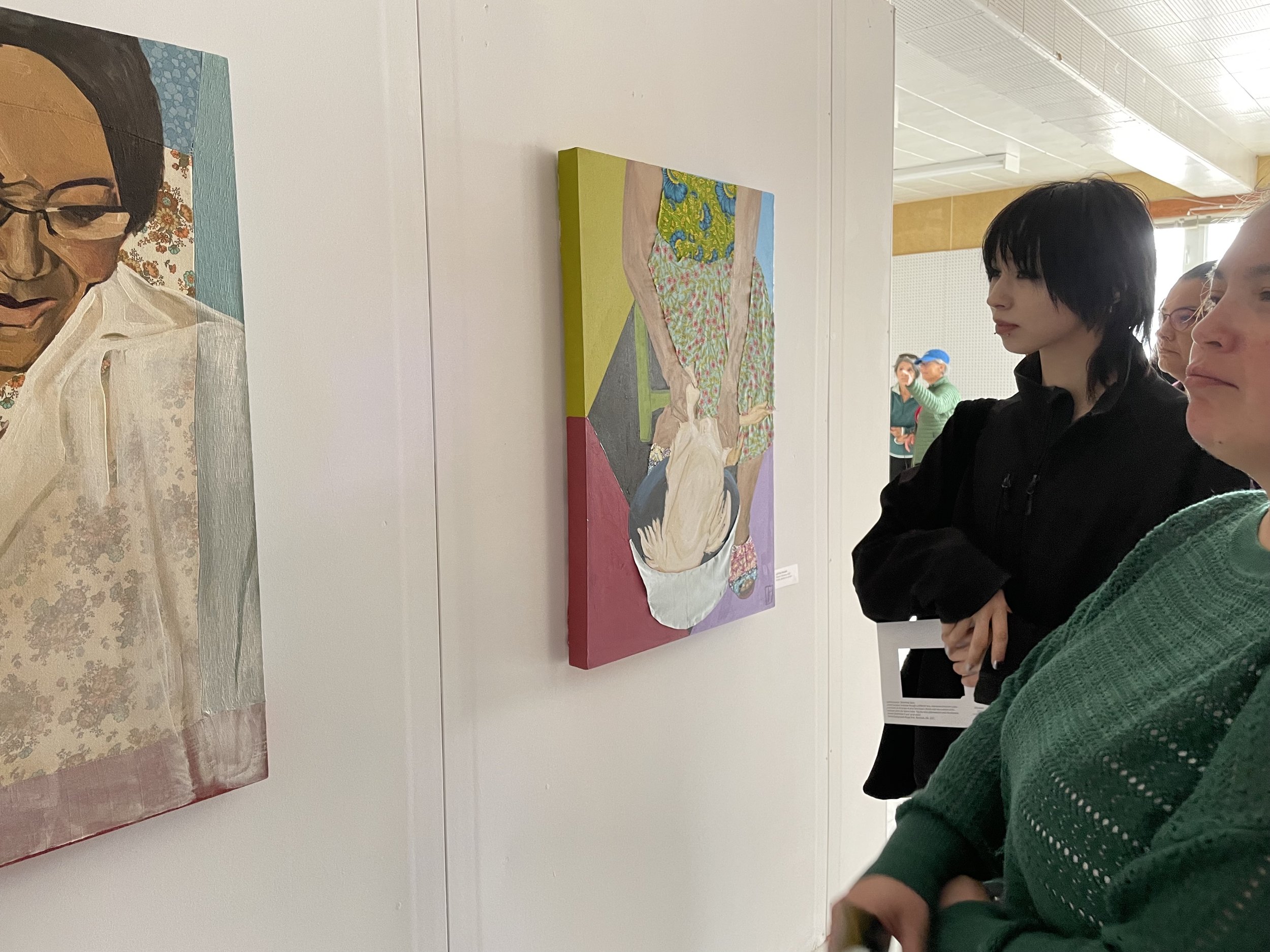  Ilinniaqtuit alumni Megan Kyak-Monteith and Napatsi Folger attend at exhibition during the Bonavista Biennale, August 2023. Bonavista, NL. Photograph by Danielle Miles. 