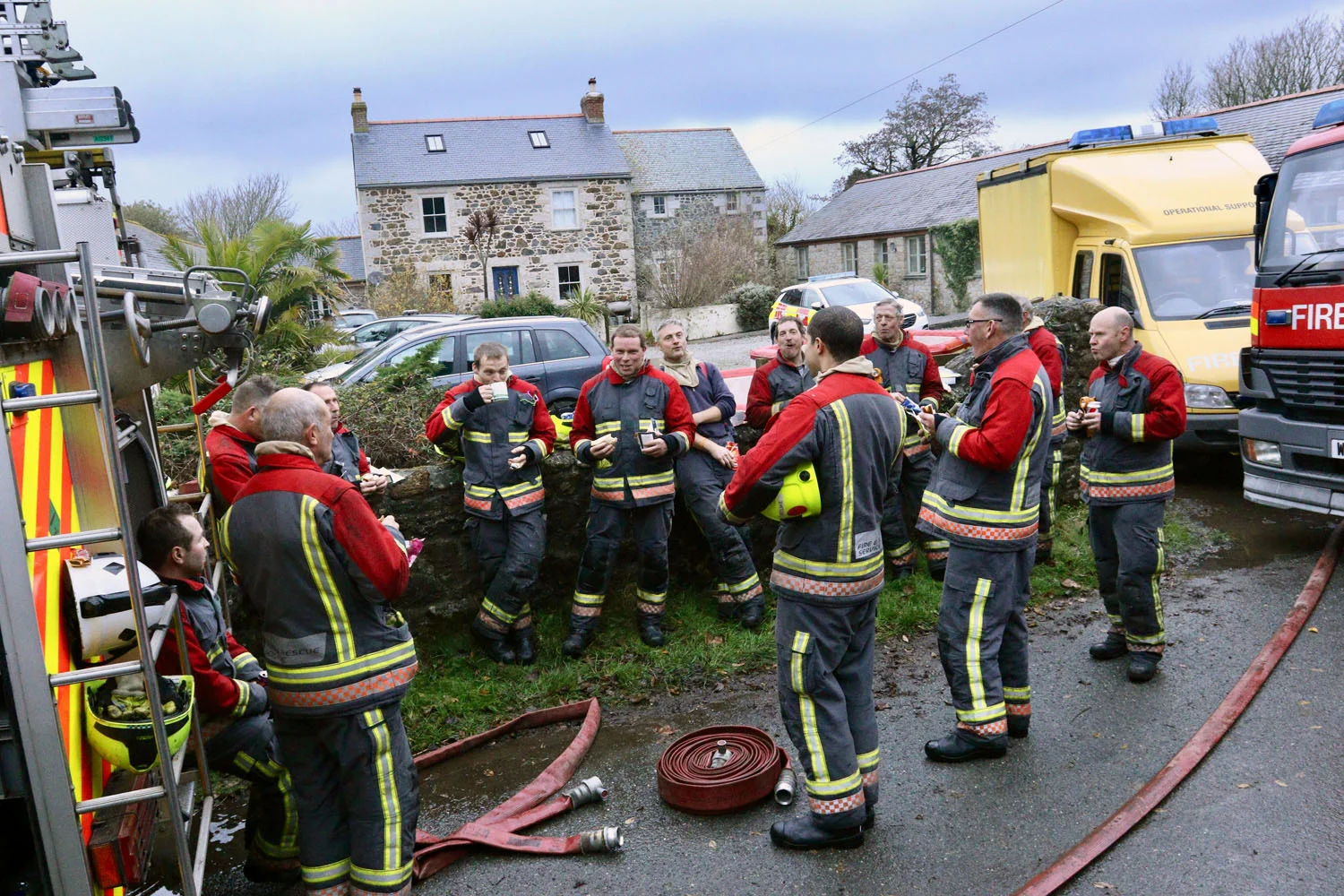  firefighters take a well earned break after a house fire, cornwall 