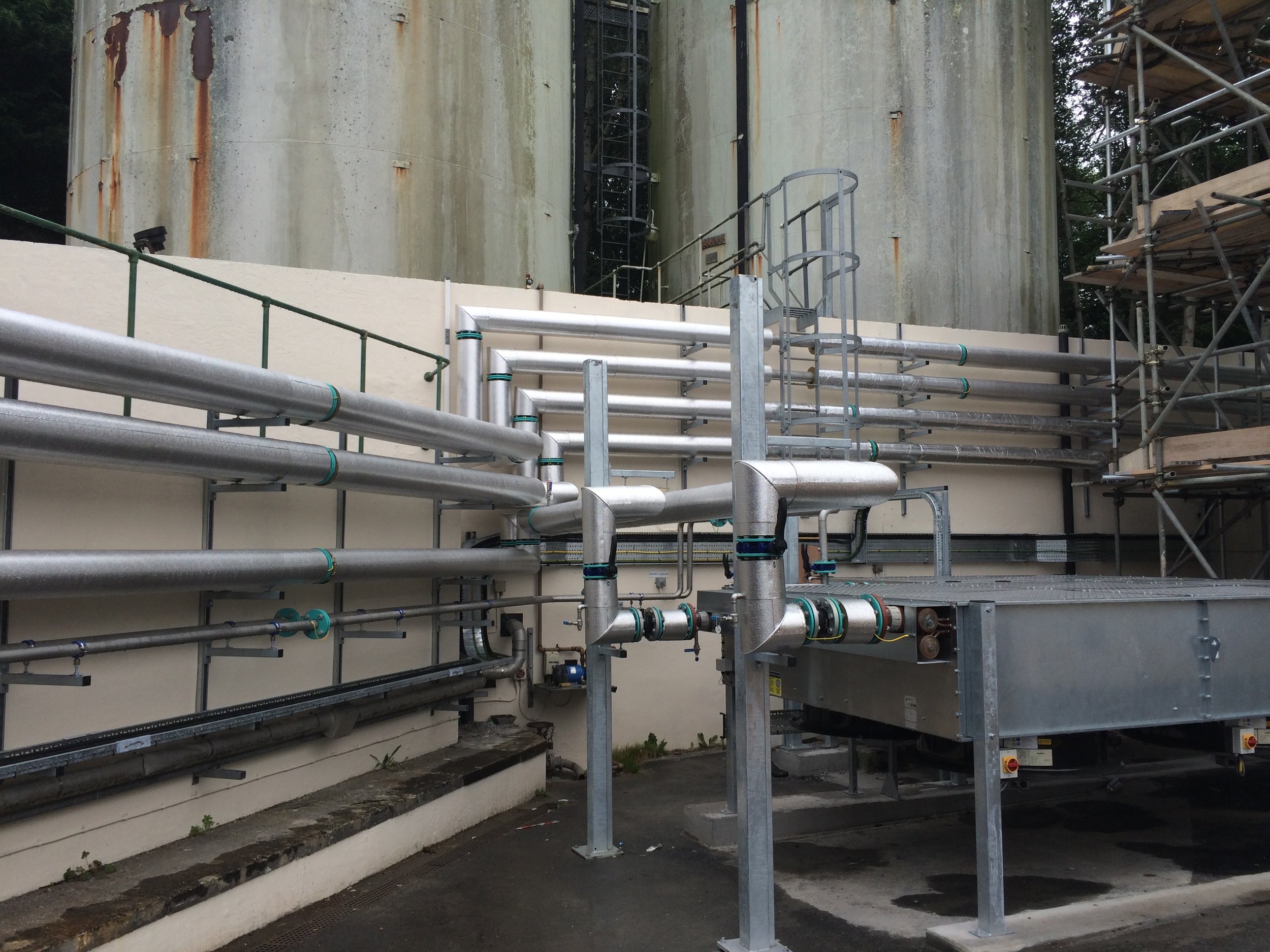 Stucco cladding over rockwool sections