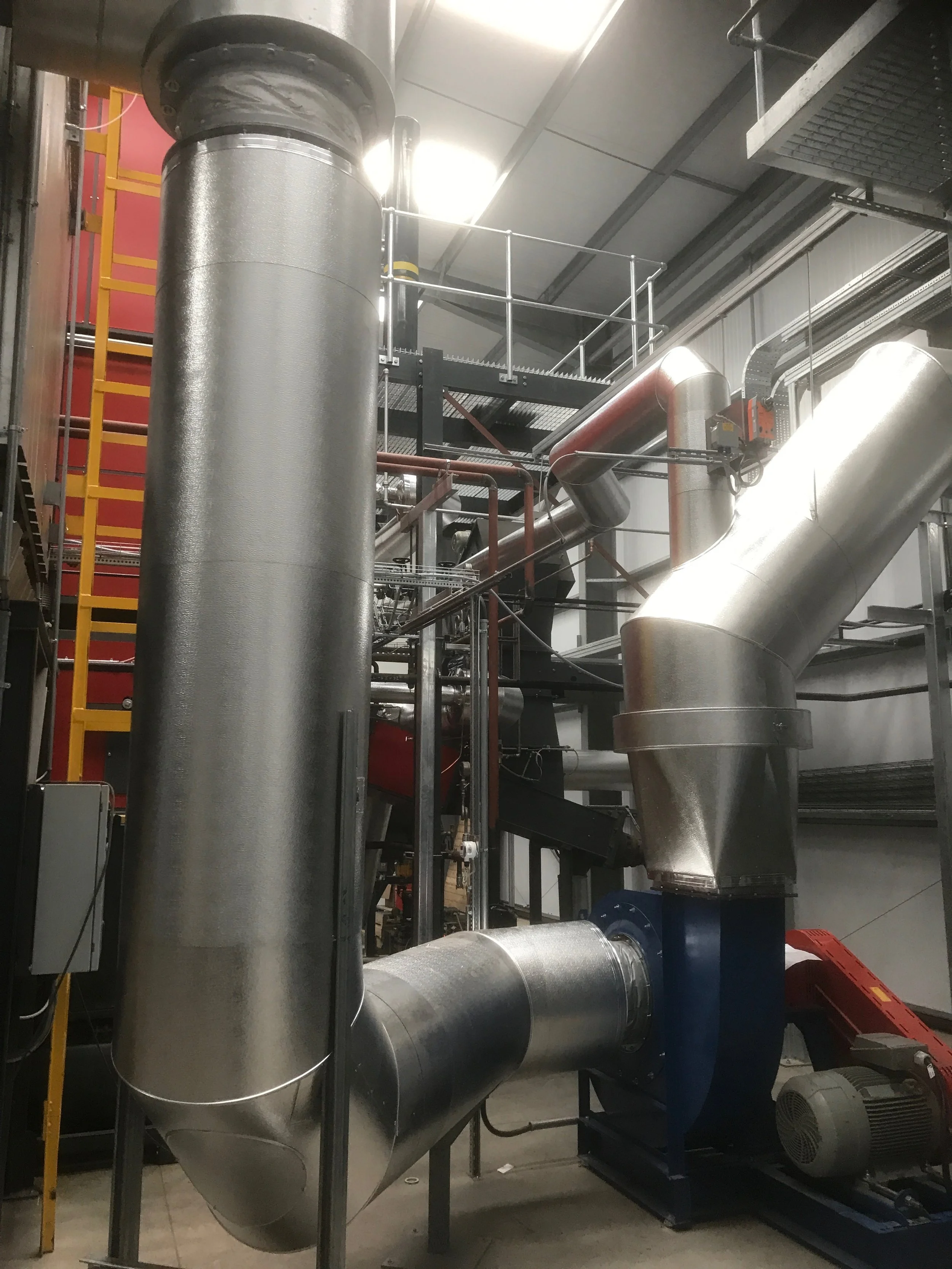 Stucco Ali cladding to generator flues