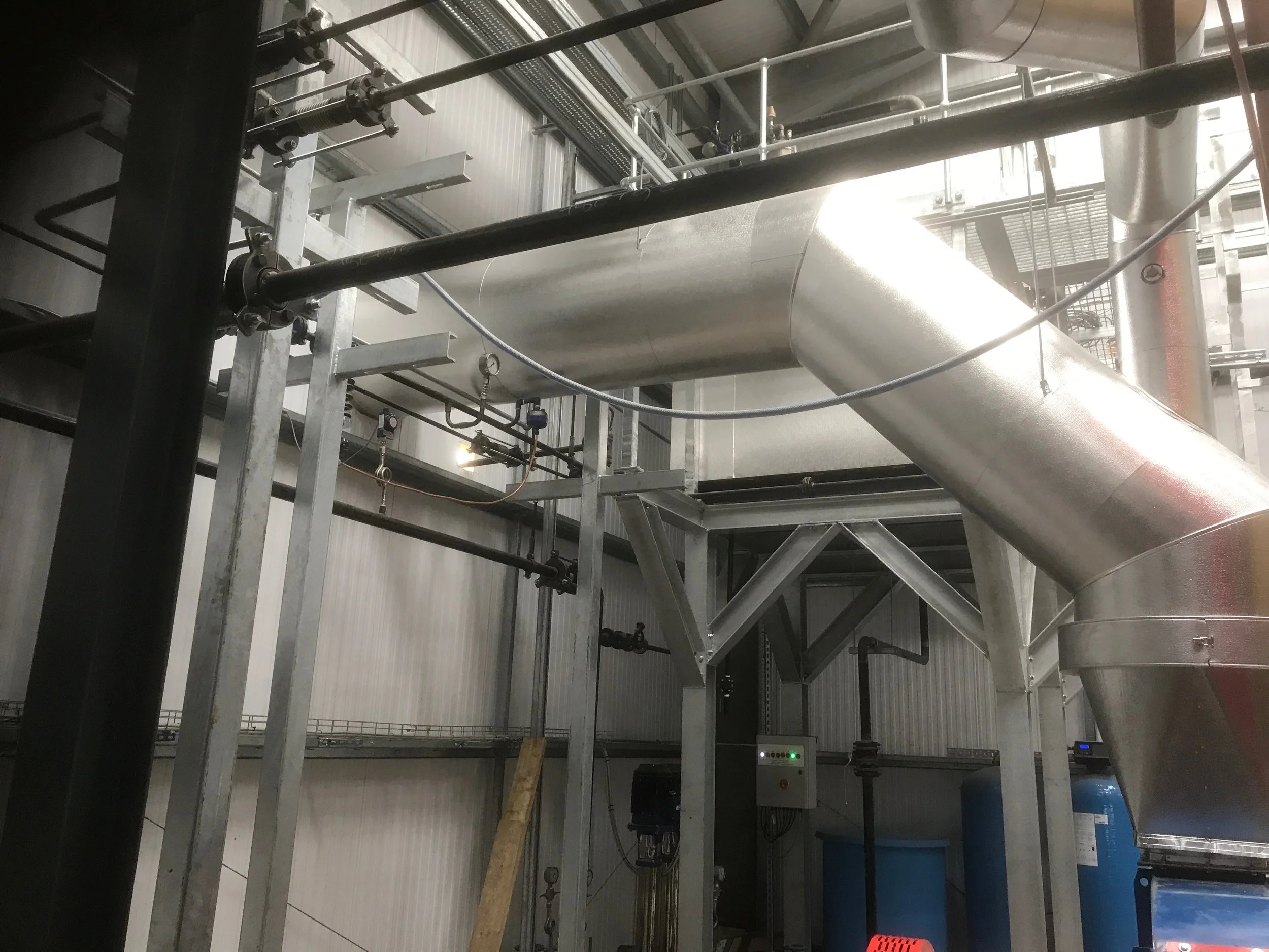 Stucco Ali cladding to generator flues