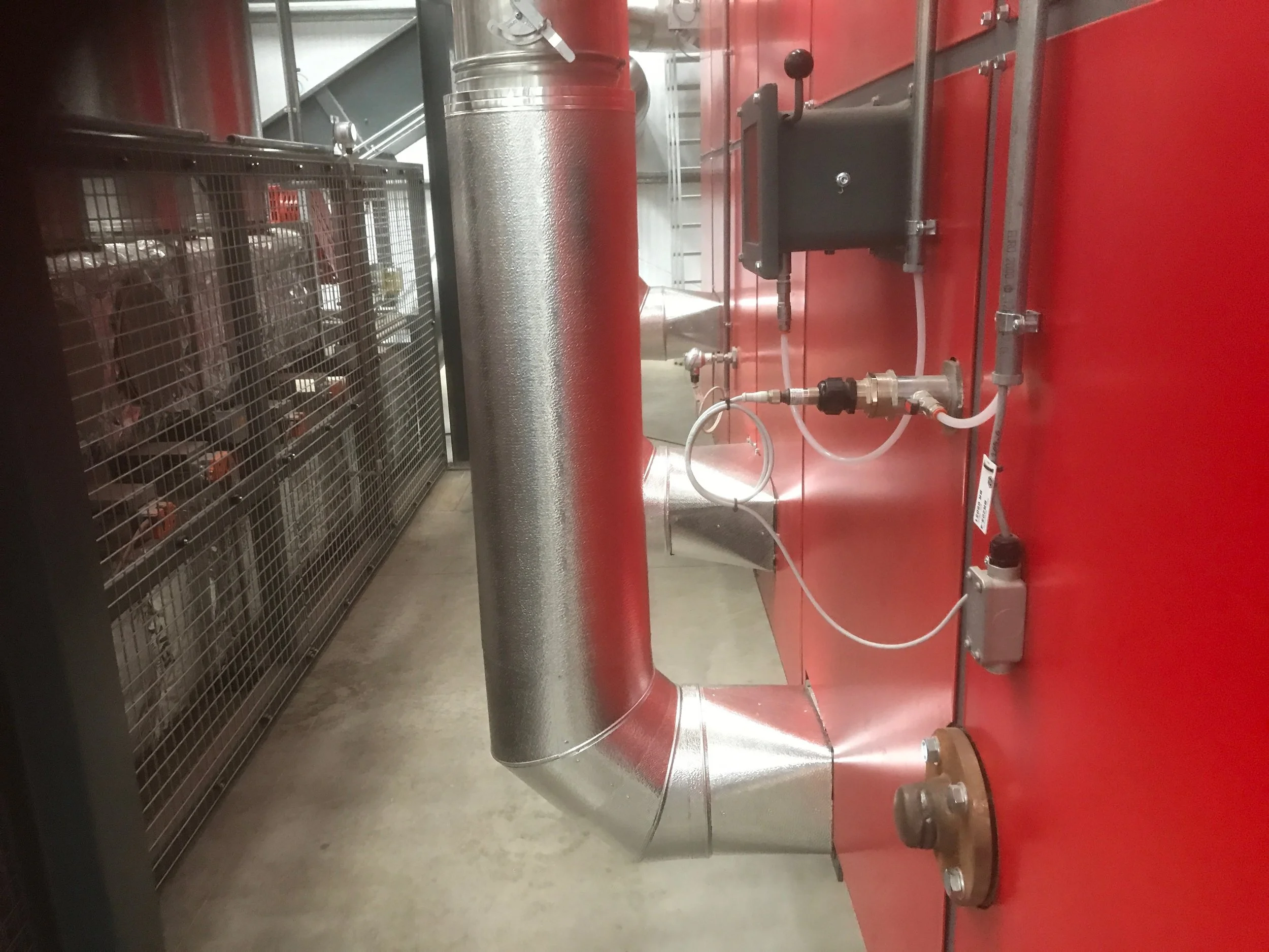 Stucco Ali cladding to generator flues