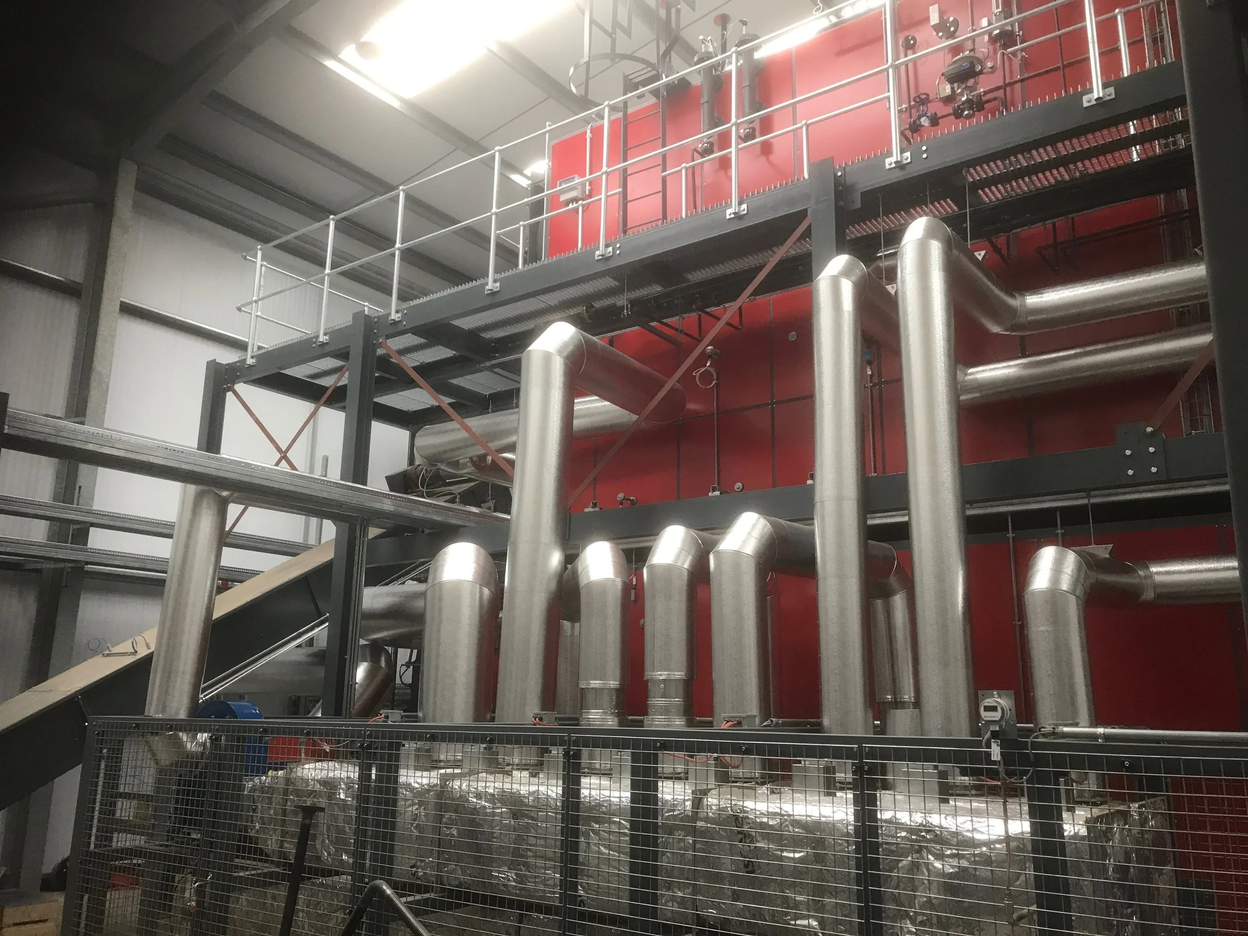 Stucco Ali cladding to generator flues