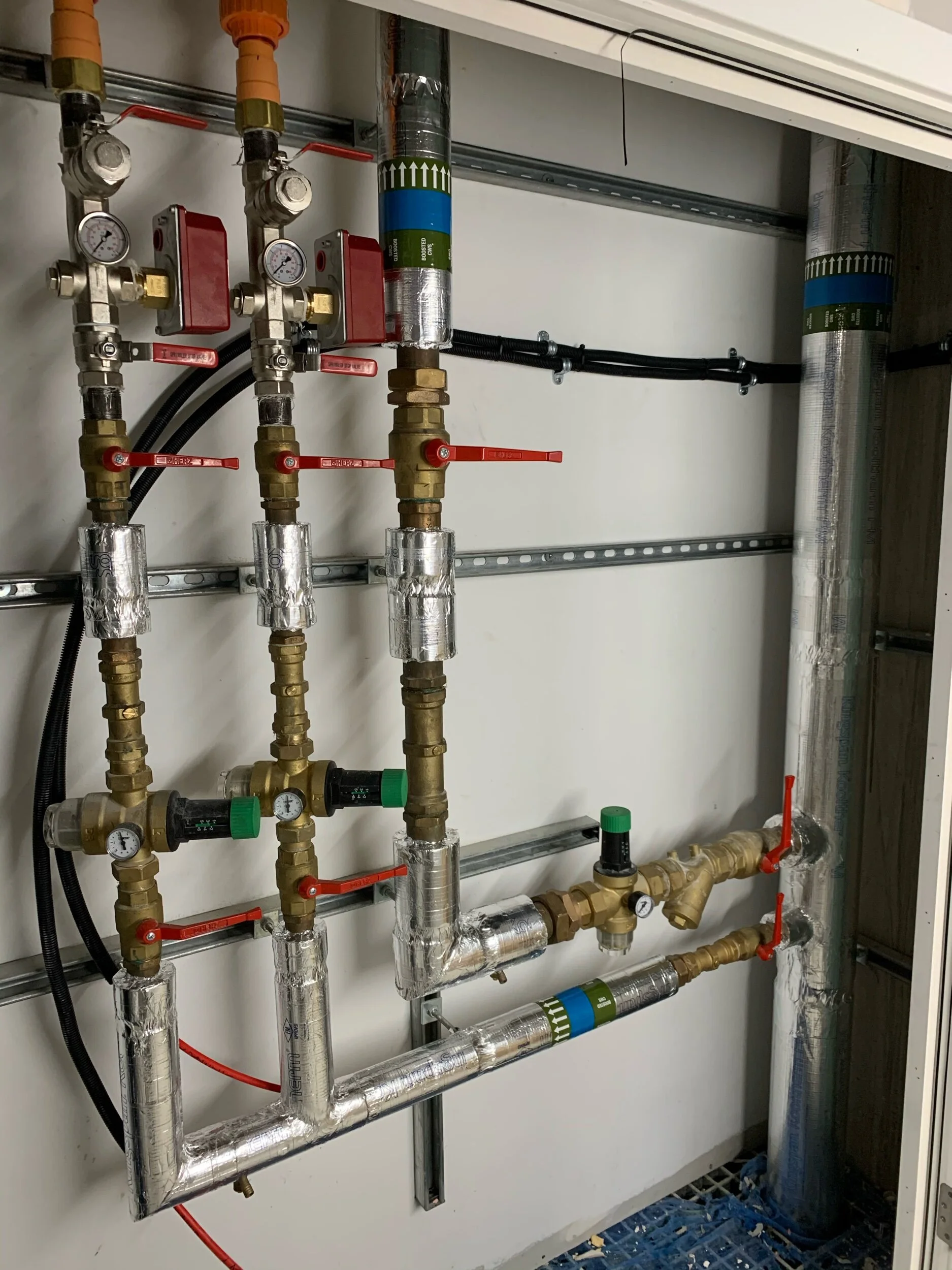 Phenolic sections to riser pipework