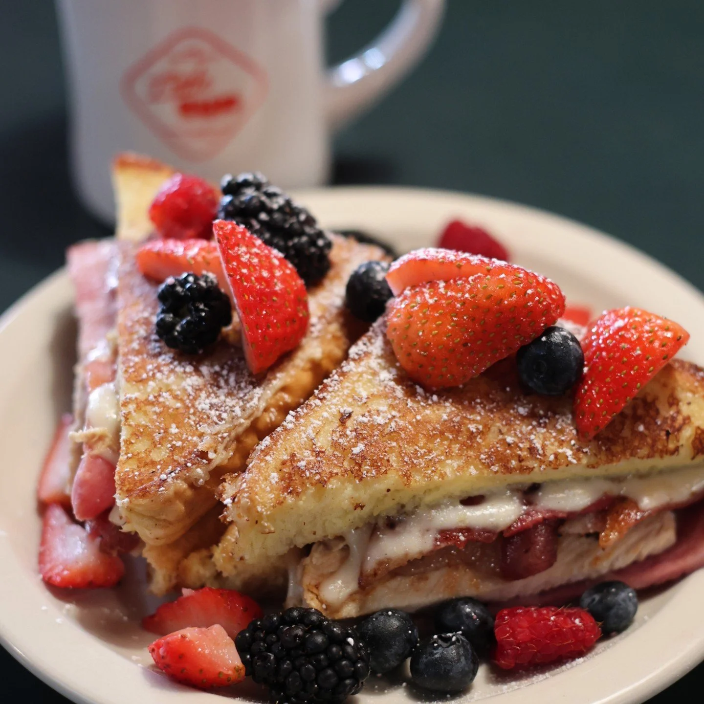 The best cure for a hangover? Easy. A Monte Cristo.

Sweet, savory, and just indulgent enough to convince your body that everything is going to be okay again. Turkey, bacon, ham, and melted Swiss tucked between thick slices of French toast, dusted wi