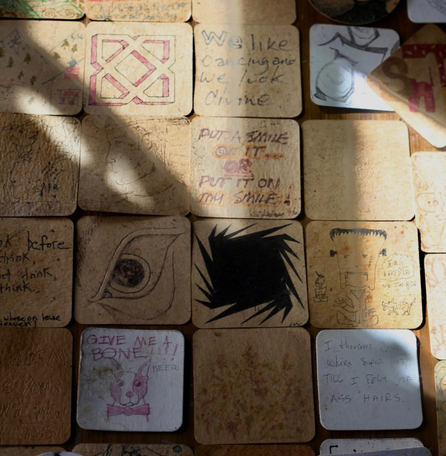 &ldquo;If these walls could talk&hellip;&rdquo; well, ours do through your art all over the coaster walls!

Over the years, you guys have turned our coasters into tiny masterpieces, weird little doodles, inside jokes, and drawings that deserve to be 