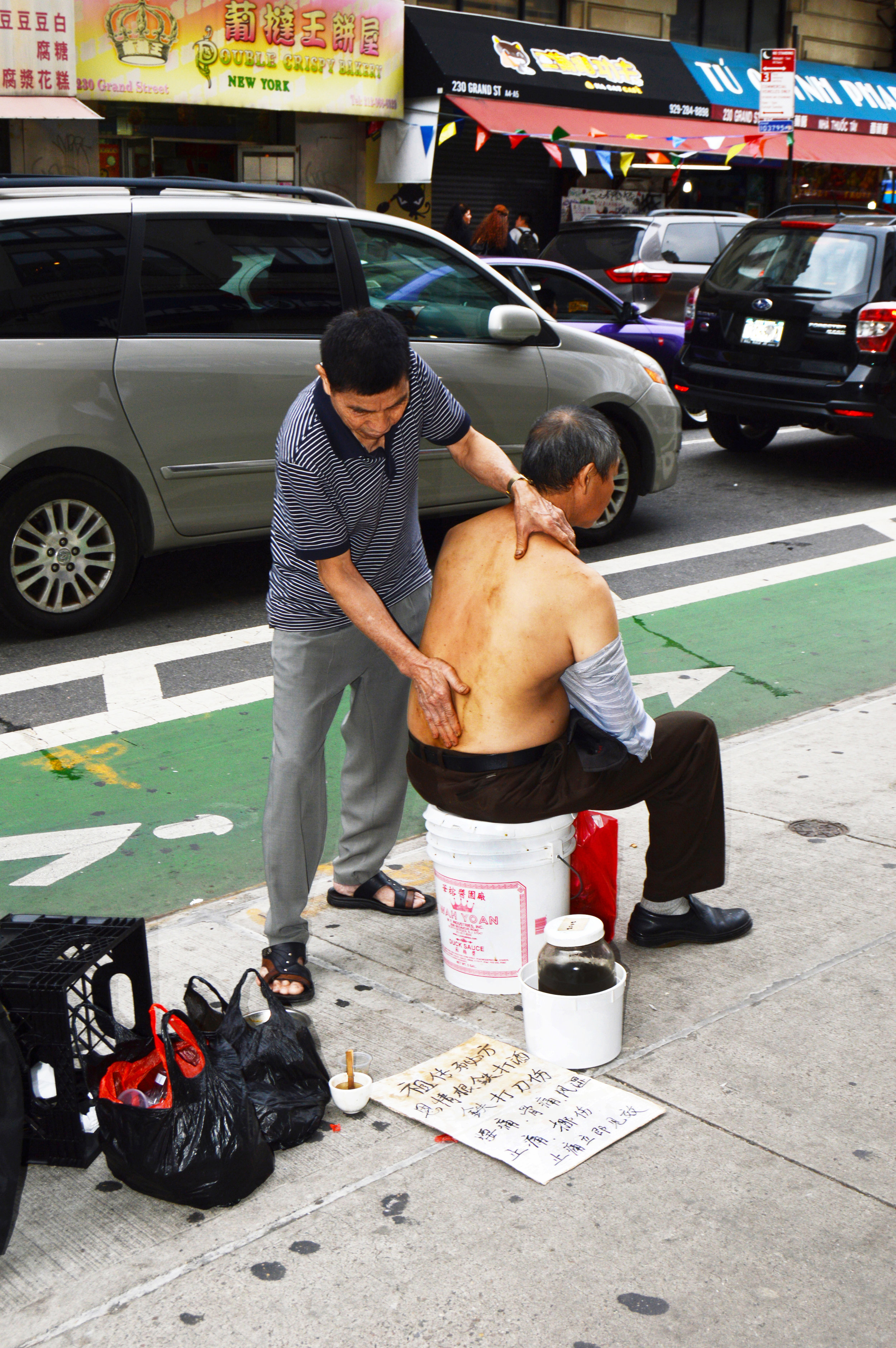  Chinatown masseuse tenderizing. 