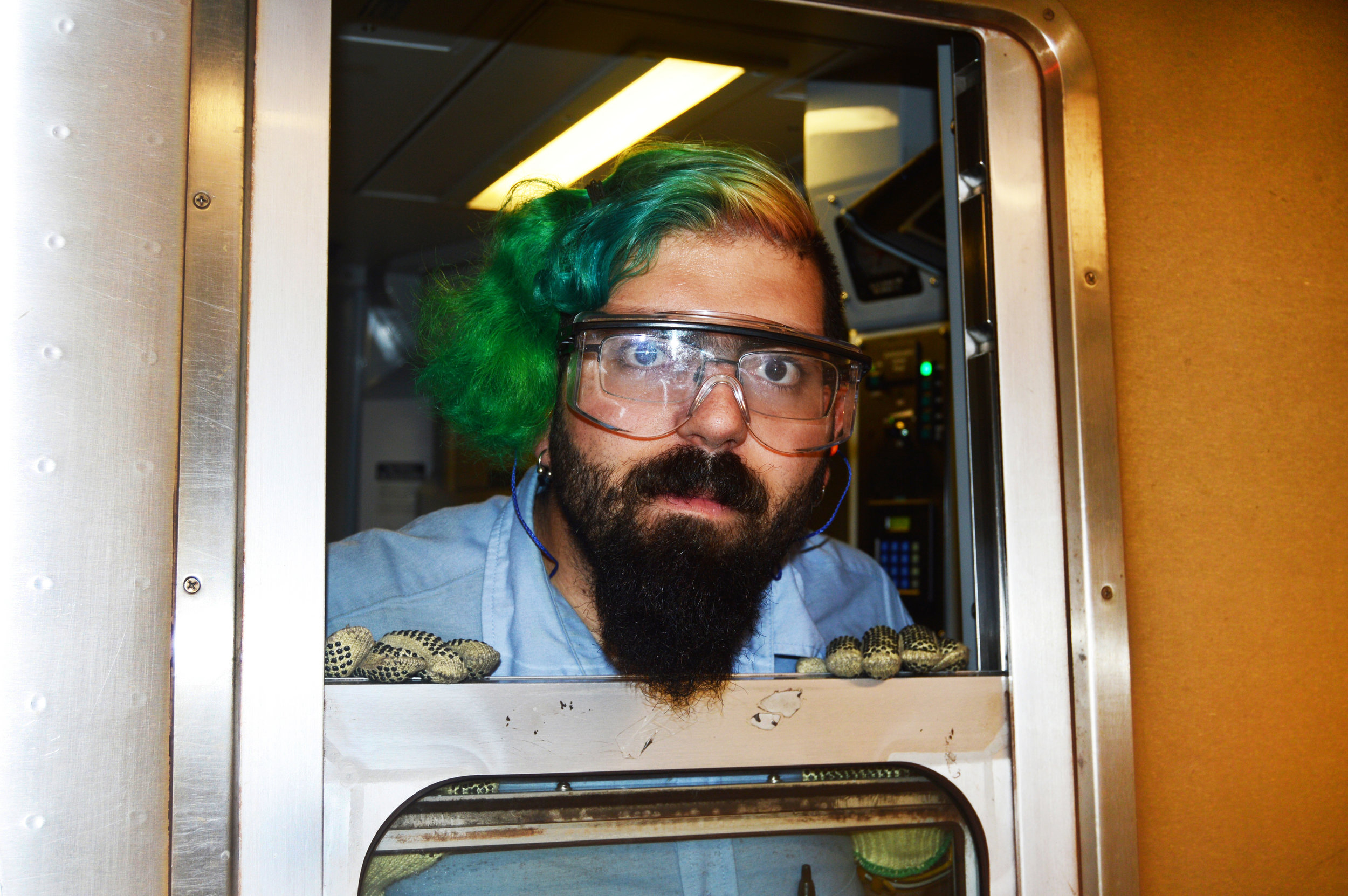  Subway conductor with jazzy hair at Prince Street Station. 