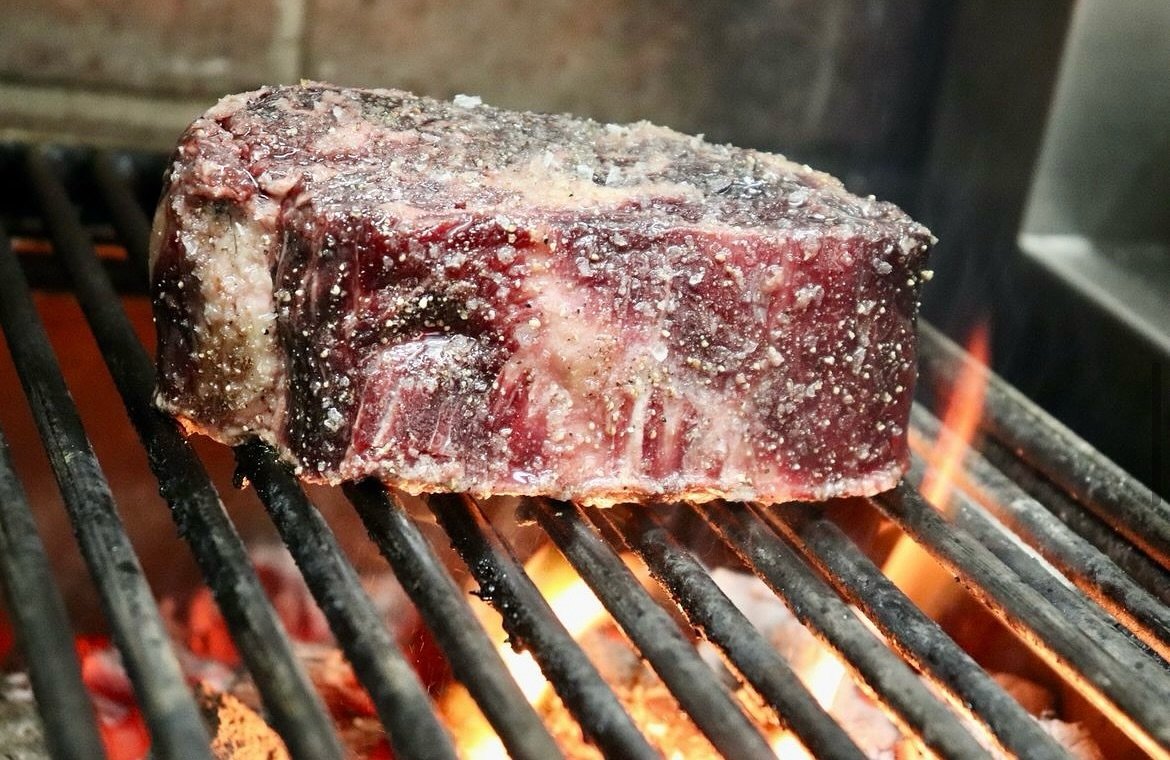 With a fun and relaxed atmosphere and the enticing smell of barbecued meats, our new menu offers a choice of steaks, all from grass-fed British and Irish beef. Expertly cut, your choice of steak is simply seasoned, grilled over charcoal, and served w