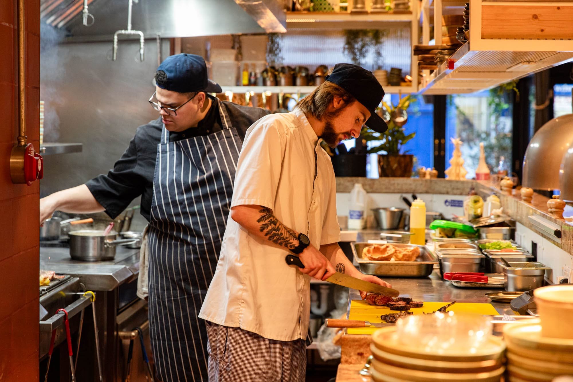 Chefs working at the open kitchen at Kindling