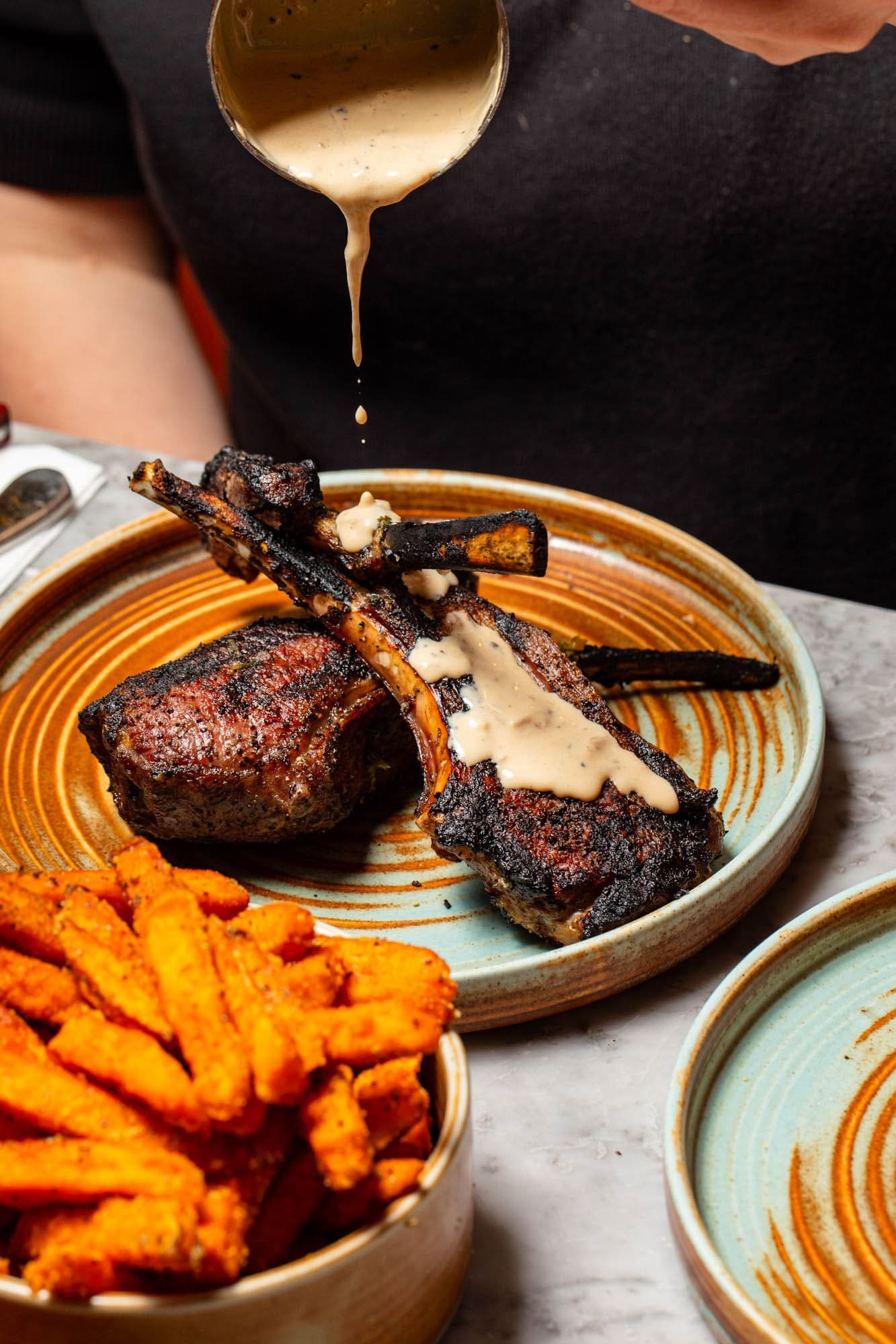Two lamb chops on a plate
