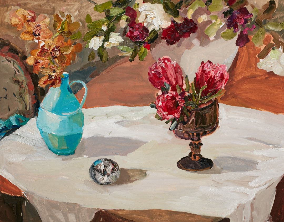 Tabletop with flowers and silver ball 
