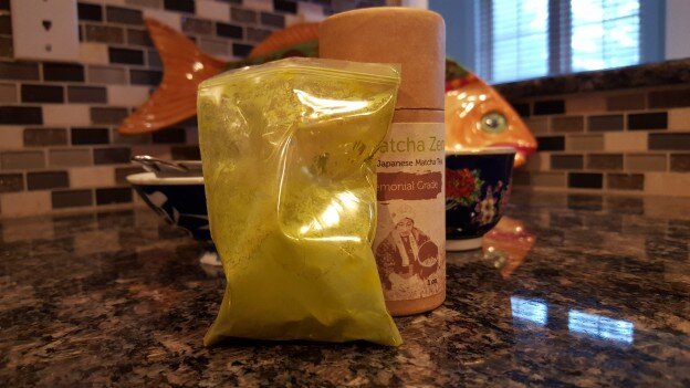 Plastic bag full of Matcha Zen Brand’s Ceremonial Grade Matcha Tea, on Kitchen Counter