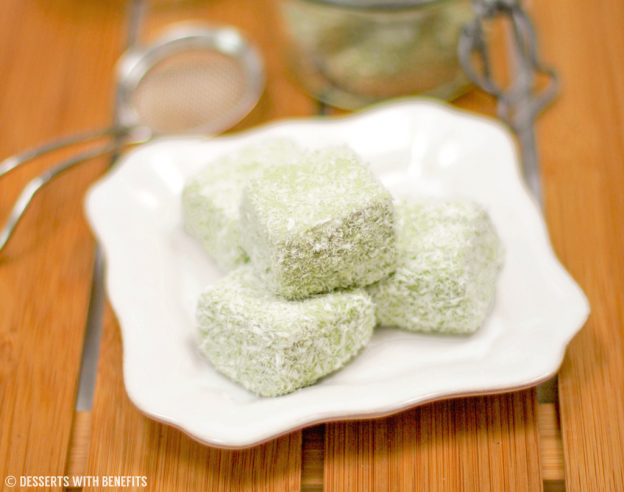 Matcha Green Tea Coconut Fudge, stacked on a white plate, ready to eat
