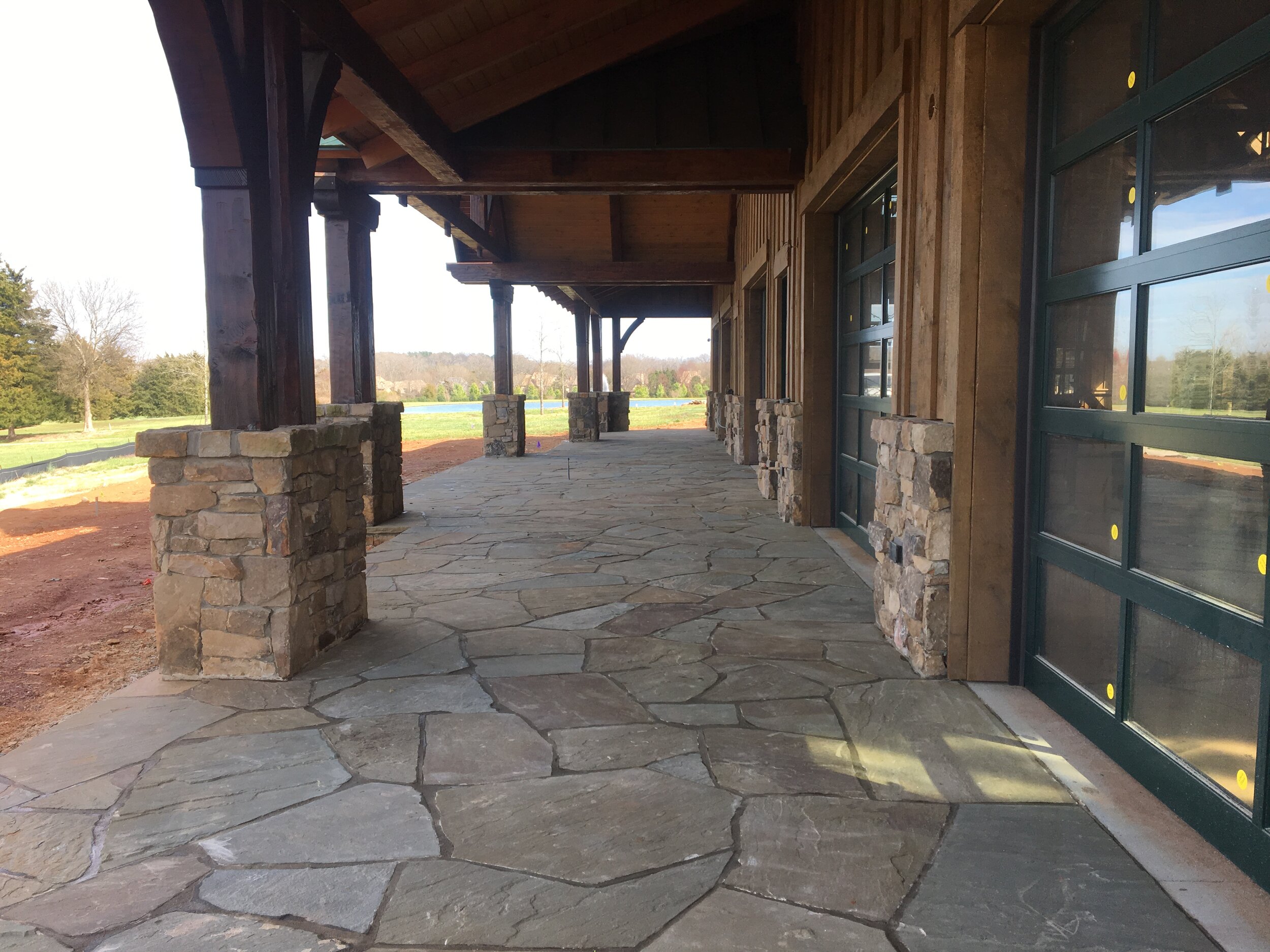 Irregular flagstone large covered landing .JPG