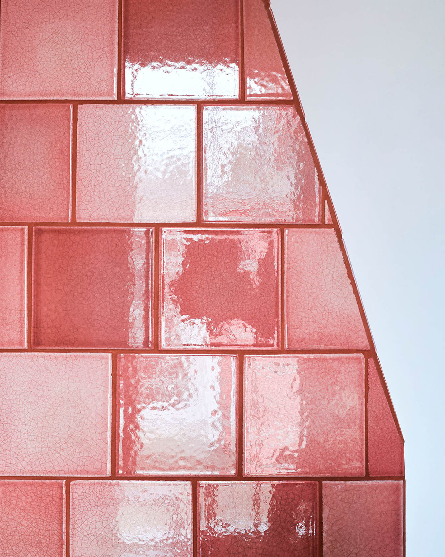 Chimney with lava stone tiles in format 10x10x1 cm glazed with 'Coral Red Shiny Crystal'  (Copy)