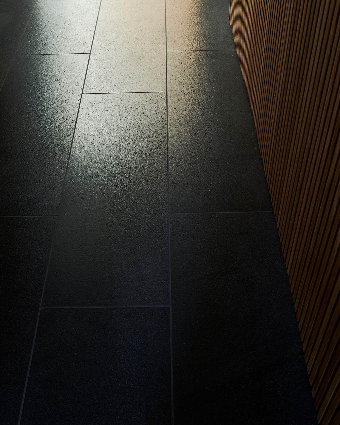Floor with natural raw lava stone tiles with brush hammered finish (Copy)