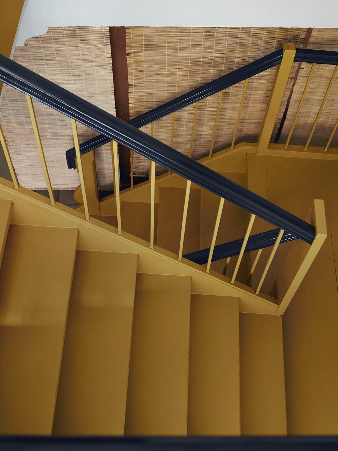 Stairs painted with 'Mean Mustard'