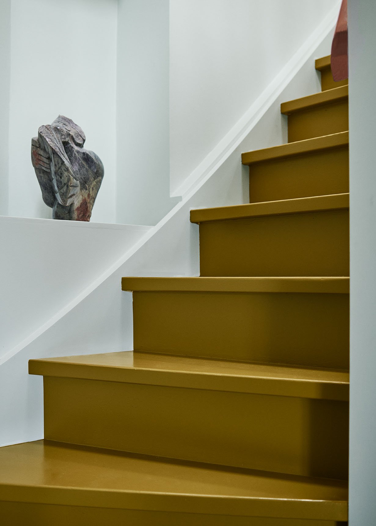 Stairs painted with 'Moss'