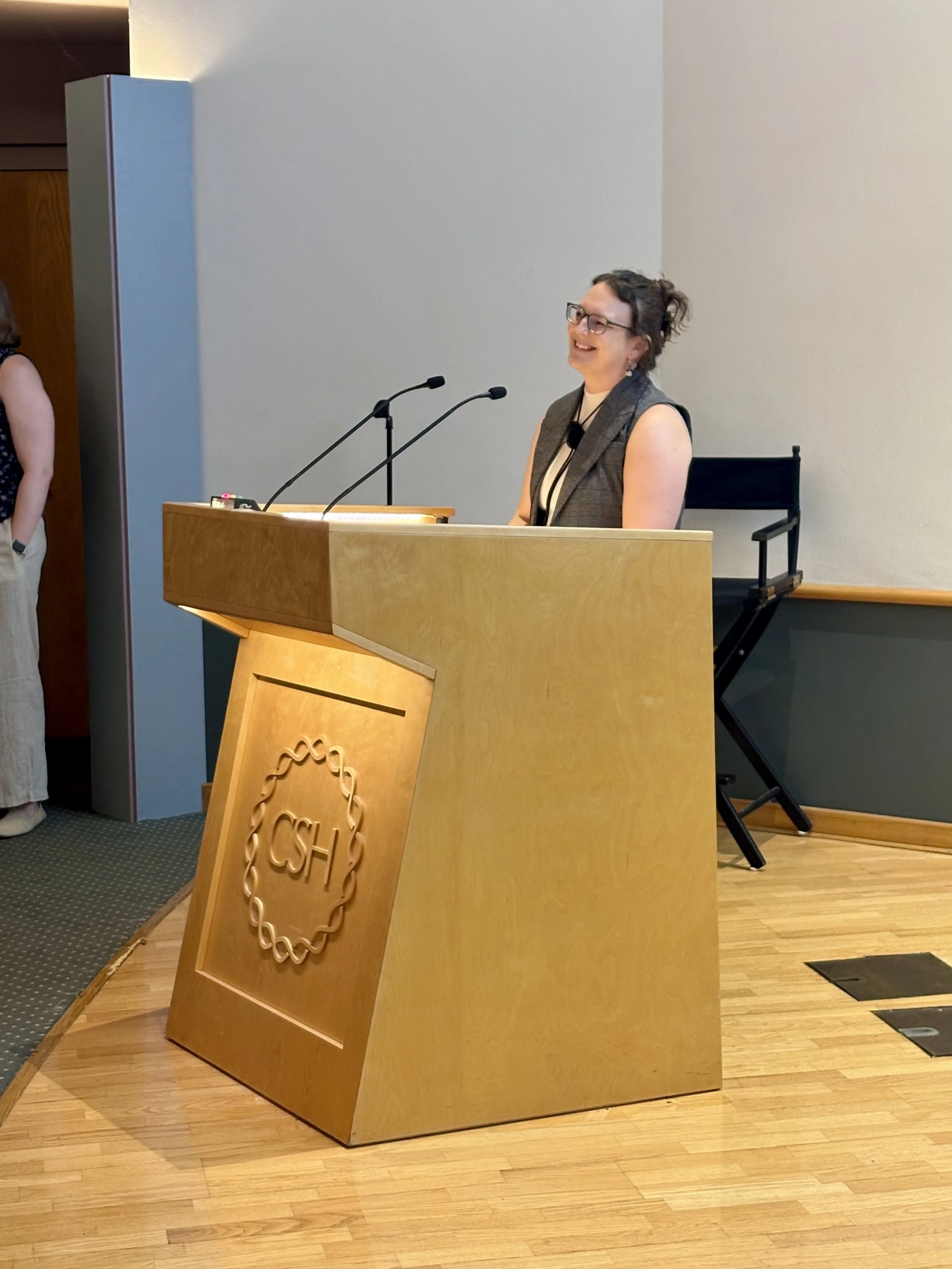Cherish gives a talk at the CSHL Glia meeting in August 2026