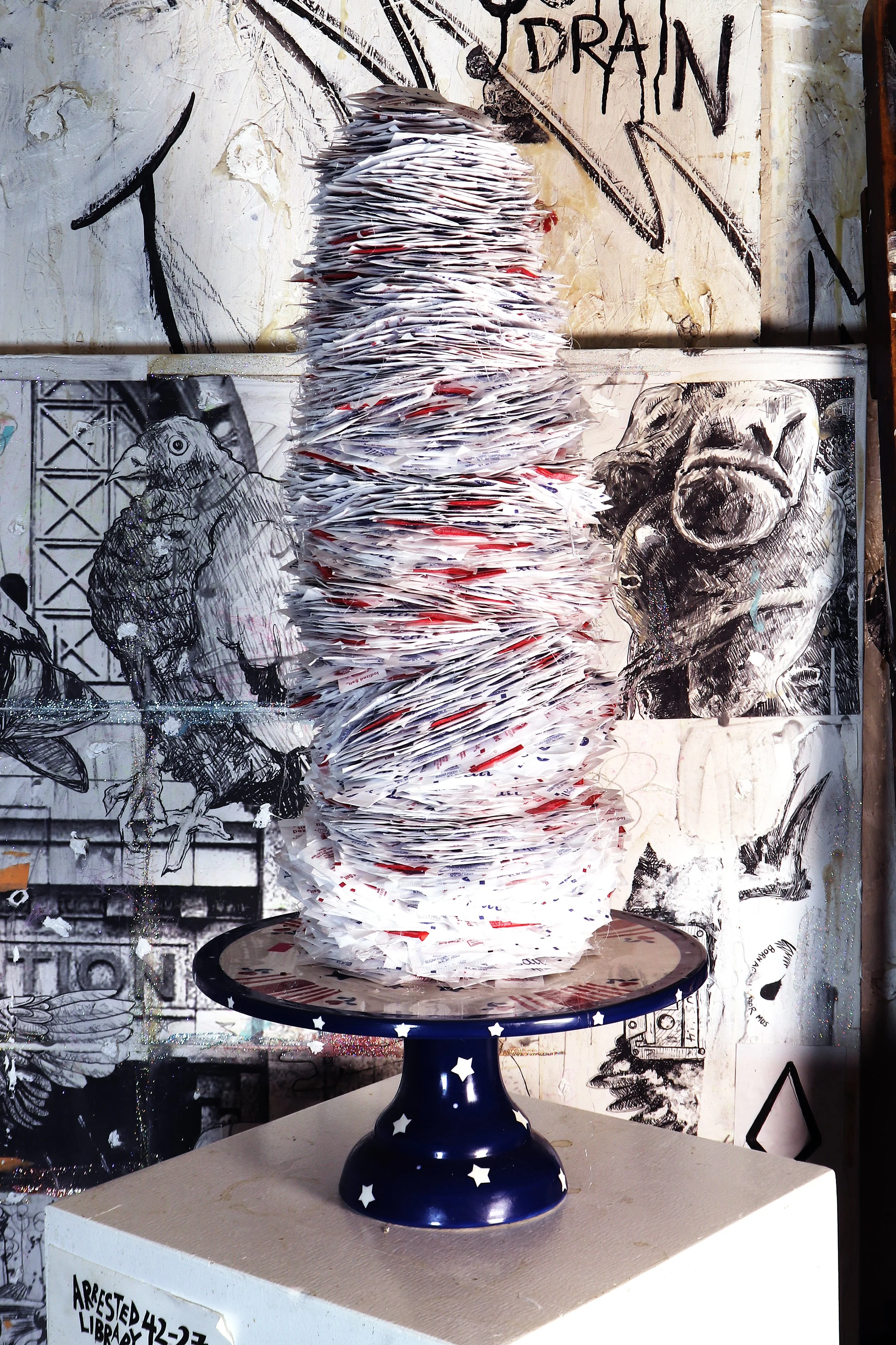 Breakfast in America Parking Lot's Wife - salt packets, glue, paper, foam on salvaged pedestal (2026)