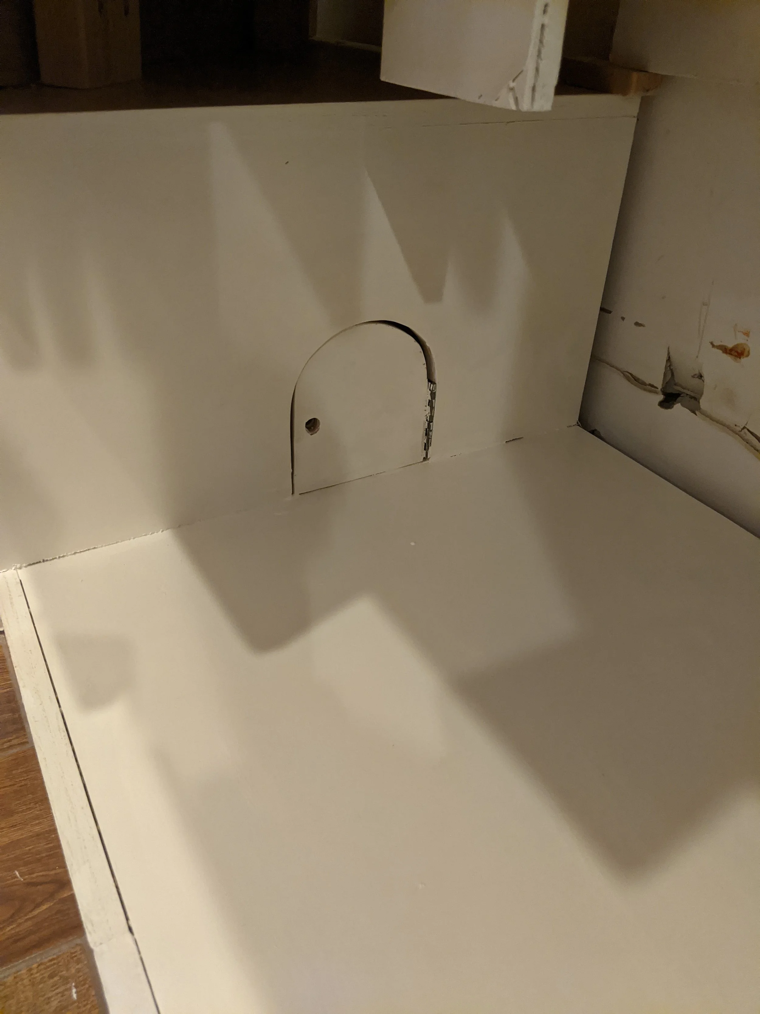  There are a couple of youngsters who live here. I wanted to add in a way for them to play. This void under the stairs does not offer much in practical use but certainly could be explored by them and their very active imaginations.  