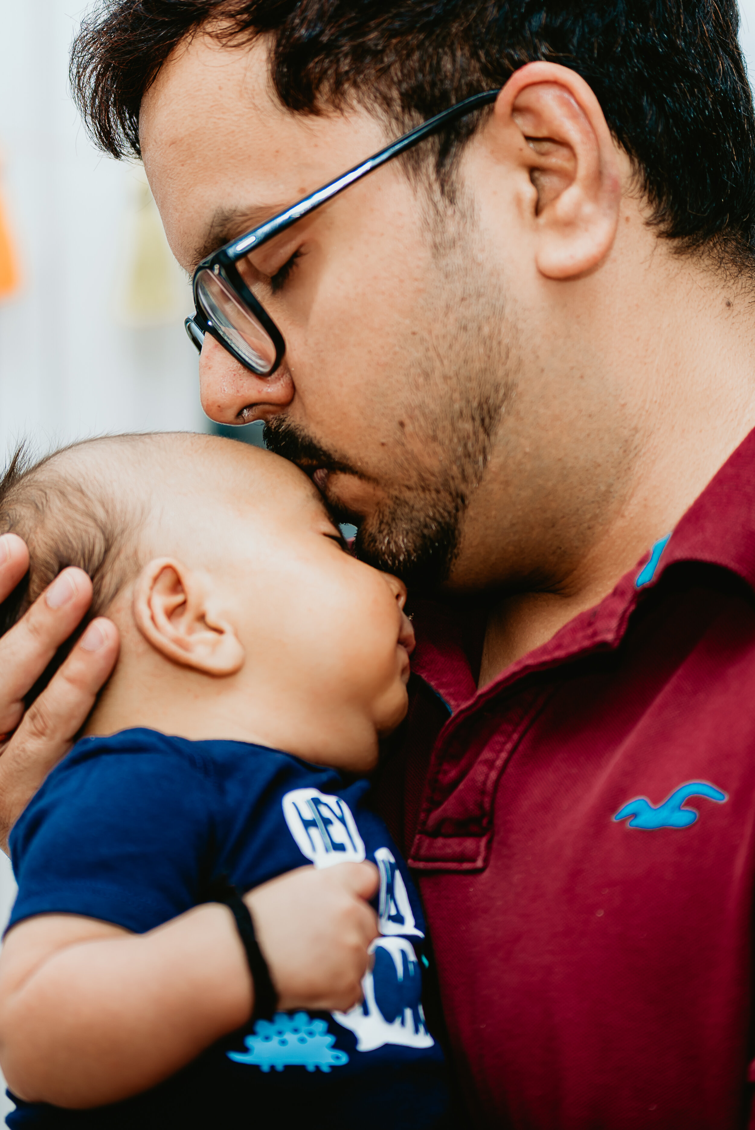  Connecticut Lifestyle Newborn Portrait of father kissing his son 