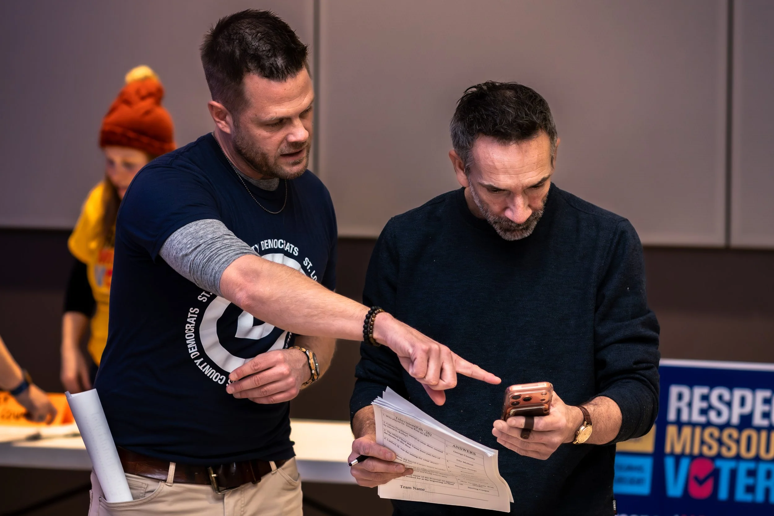 Executive Director Mike Gallagher directing setup at Trivia Night