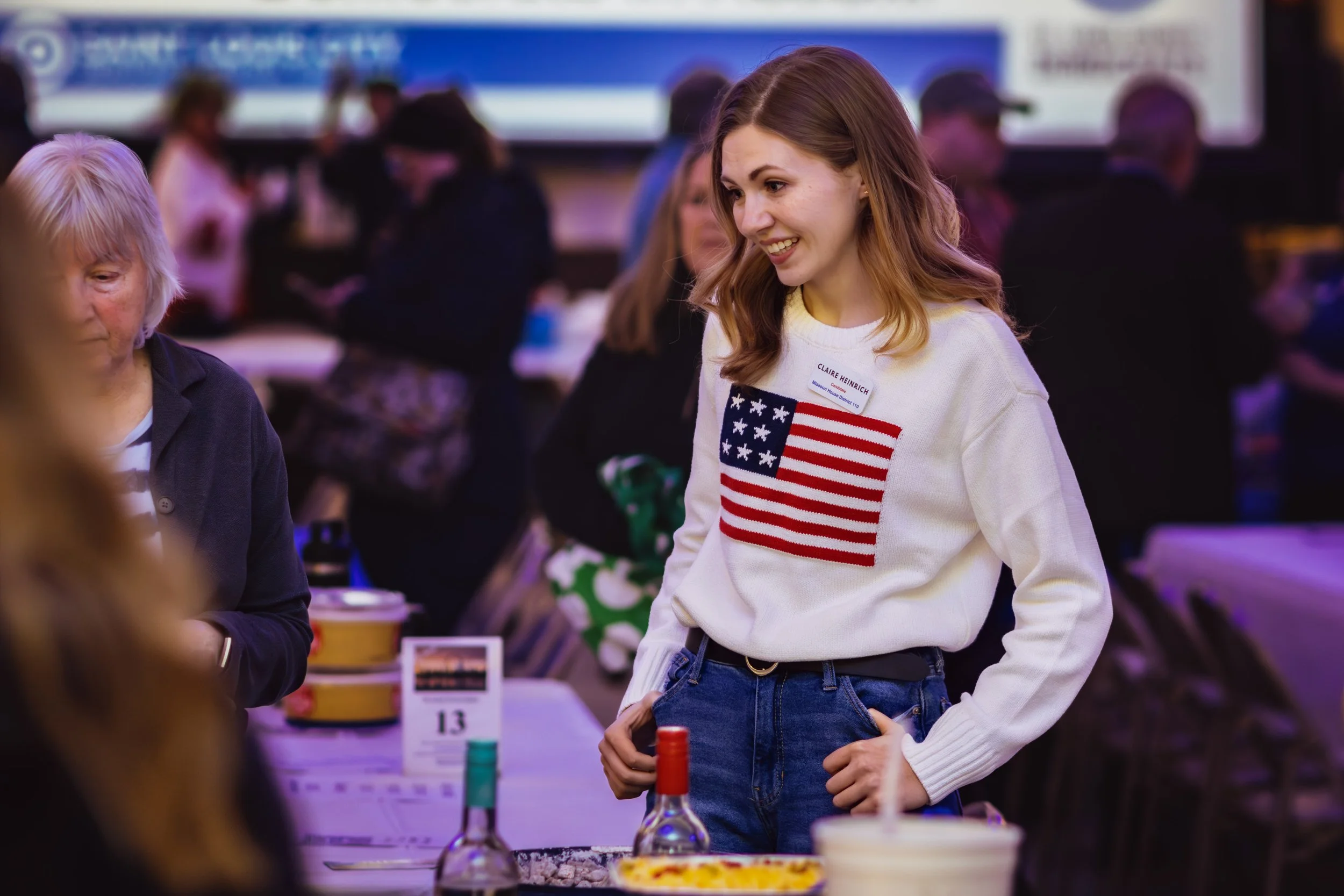 State Rep candidate Claire Heinrich in an American flag shirt