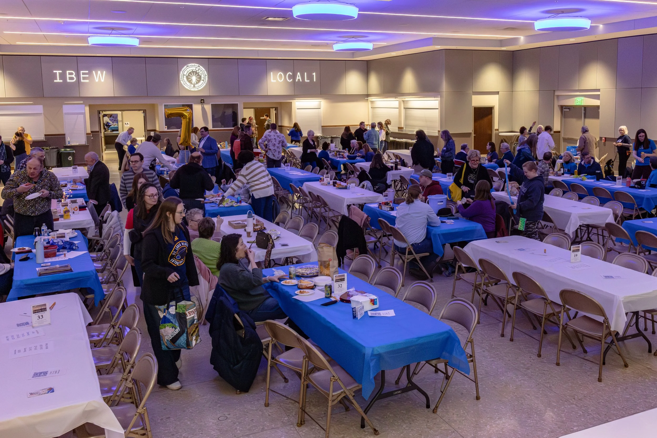 Trivia room full of tables as people begin to arrive