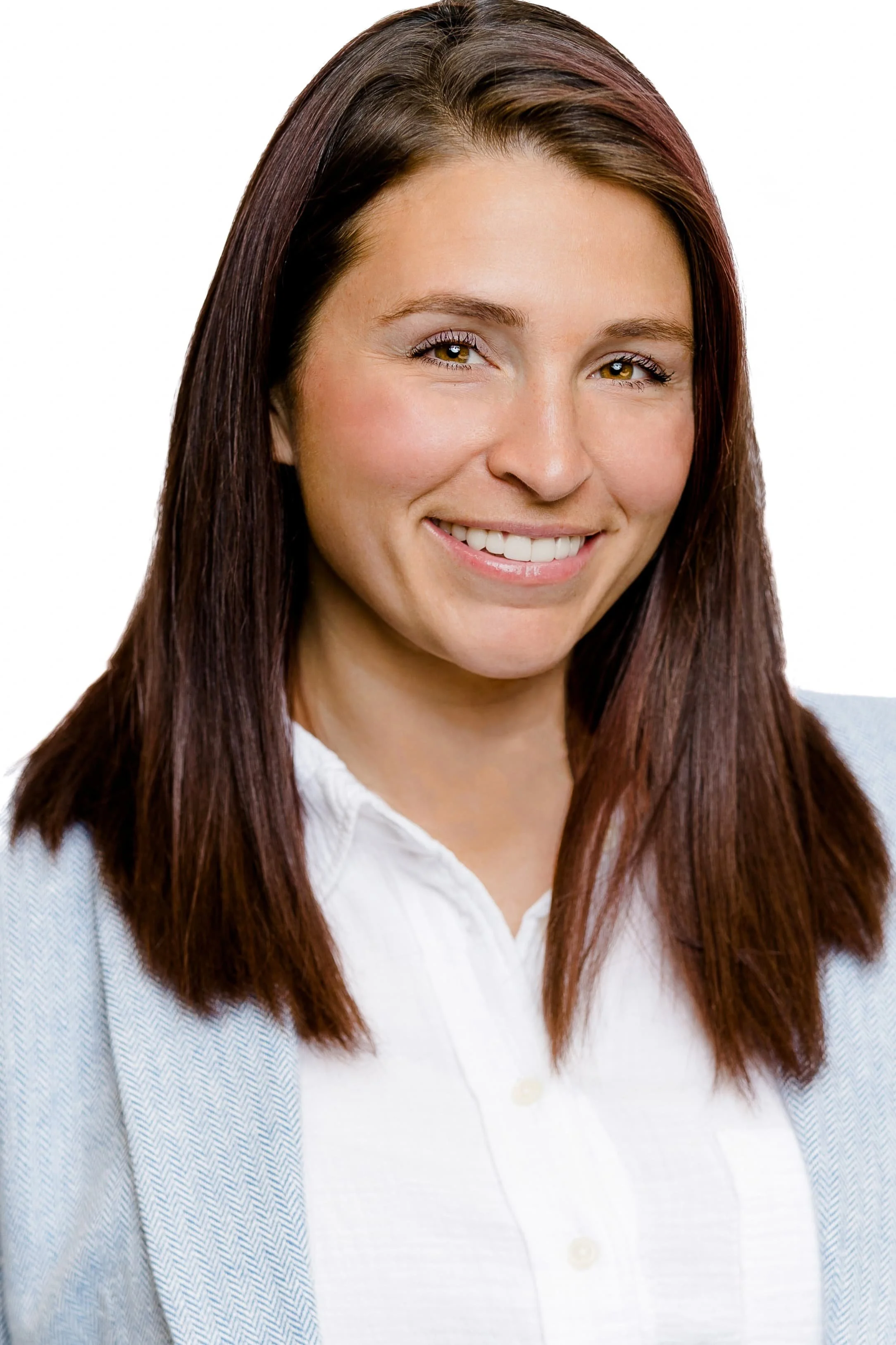 Newborn care specialist and postpartum doula, Sara, posing for professional headshot.