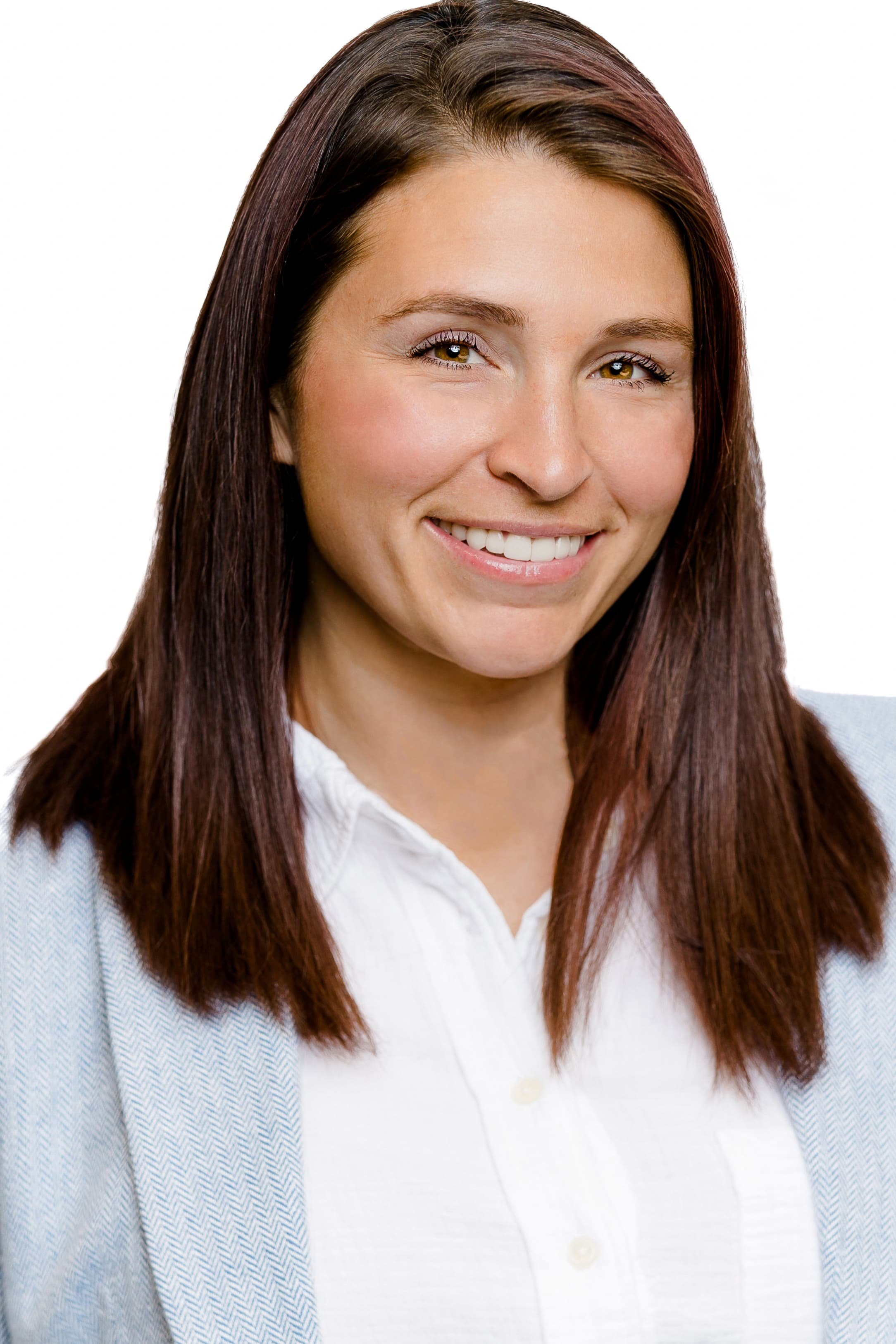 A professional headshot of Sara, a sleep technician and NCS at The Baby Hive.