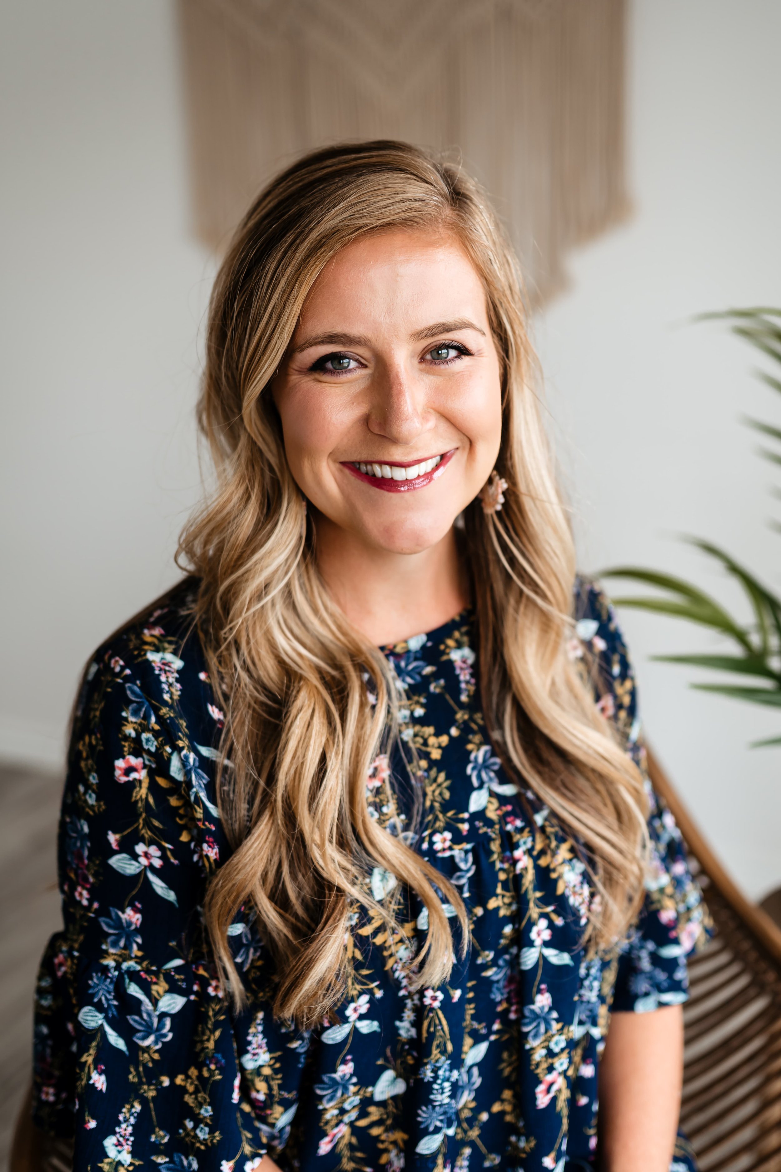 Meredith, a postpartum and birth doula, posing for professional photo in Salt Lake City, Utah.