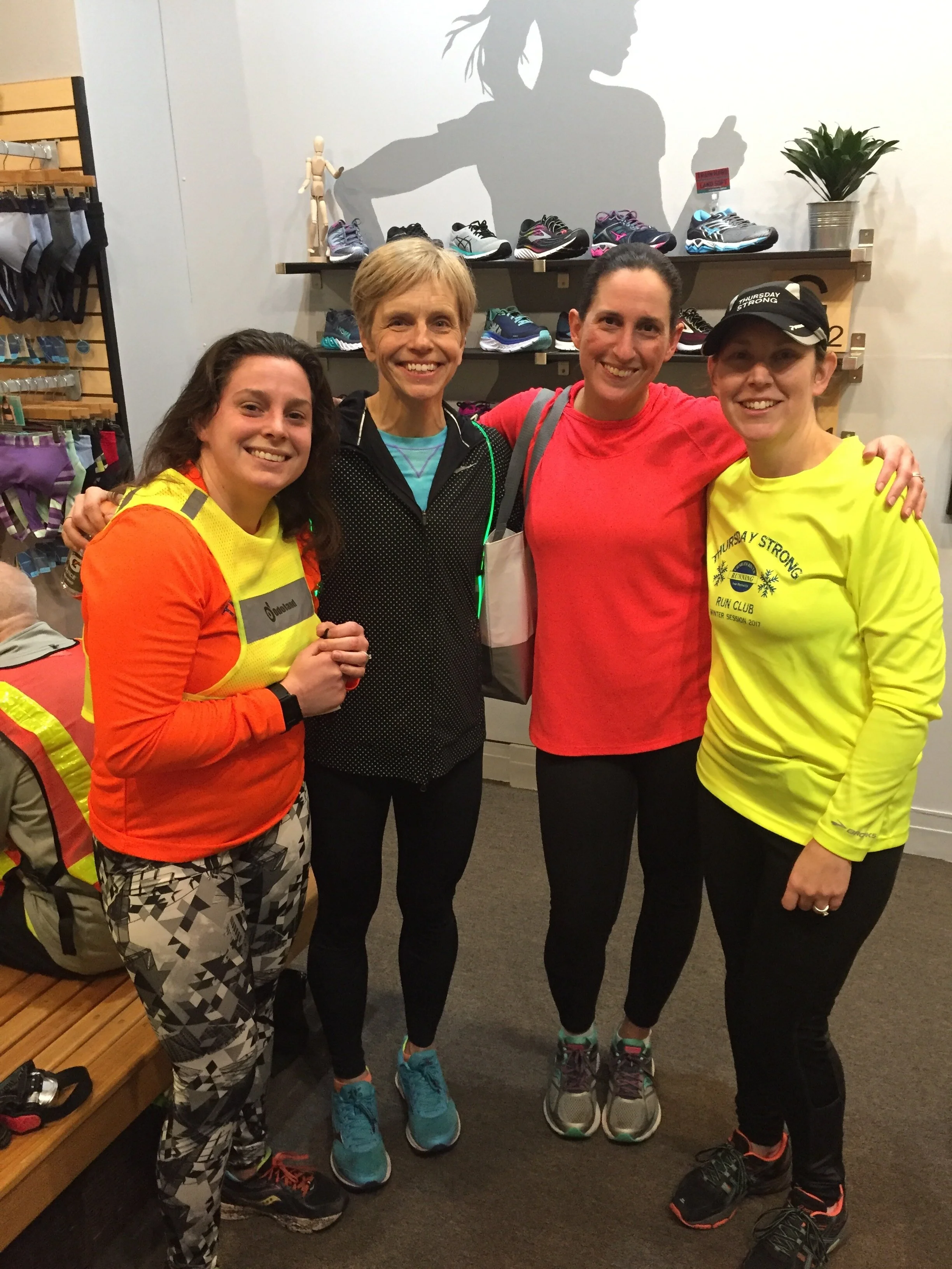 Running friends inside sneaker store Norwood, MA