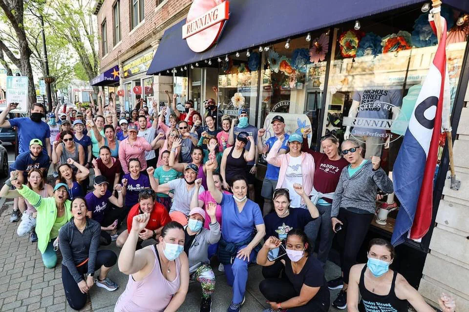 Group of runners outside the sneaker running store in Norwood MA