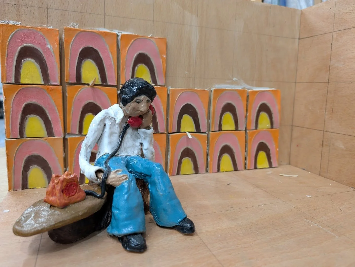 Marcus has been hard at work bringing this ceramic living room to life &mdash; Today the fabulous wall tiles were being installed. We can't wait for the rest of the family join him.