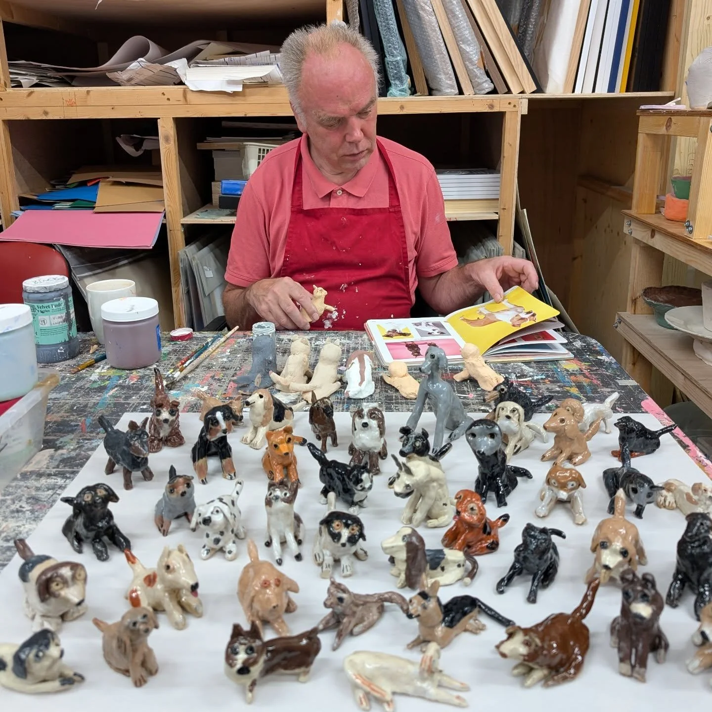 There&rsquo;s something lovely about the way Paul works&mdash;sitting quietly in the studio, turning pages of dog-eared books, studying each breed before sculpting  them into beautiful miniature ceramics.

Watching this collection of beloved dogs gro