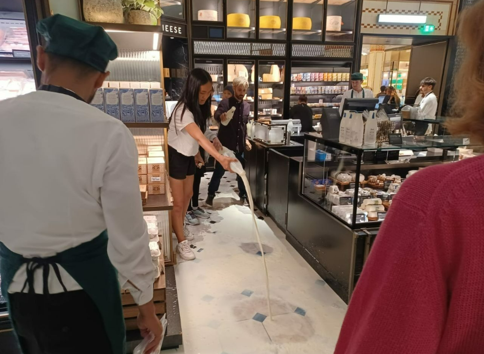 Why did Animal Rebellion pour out milk at Harrods?