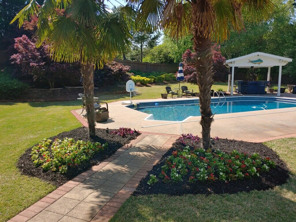 flowers and trees by pool.jpg