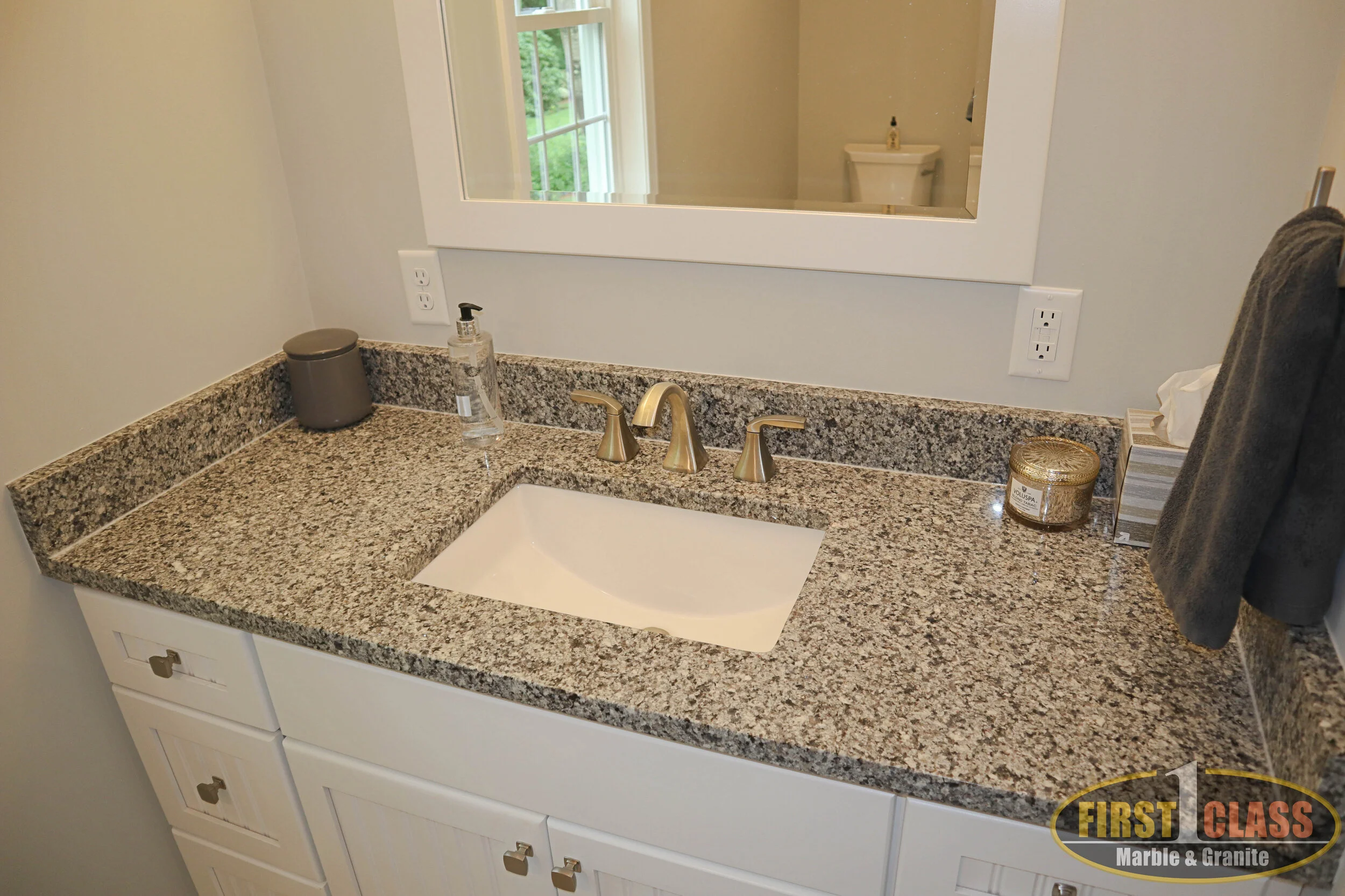 Material: Azul Platino Thickness, Finish & Stone Type: 3 CM Polished Granite Edge: 1/4" Radius Sink: Client Sink: Under-Mount
